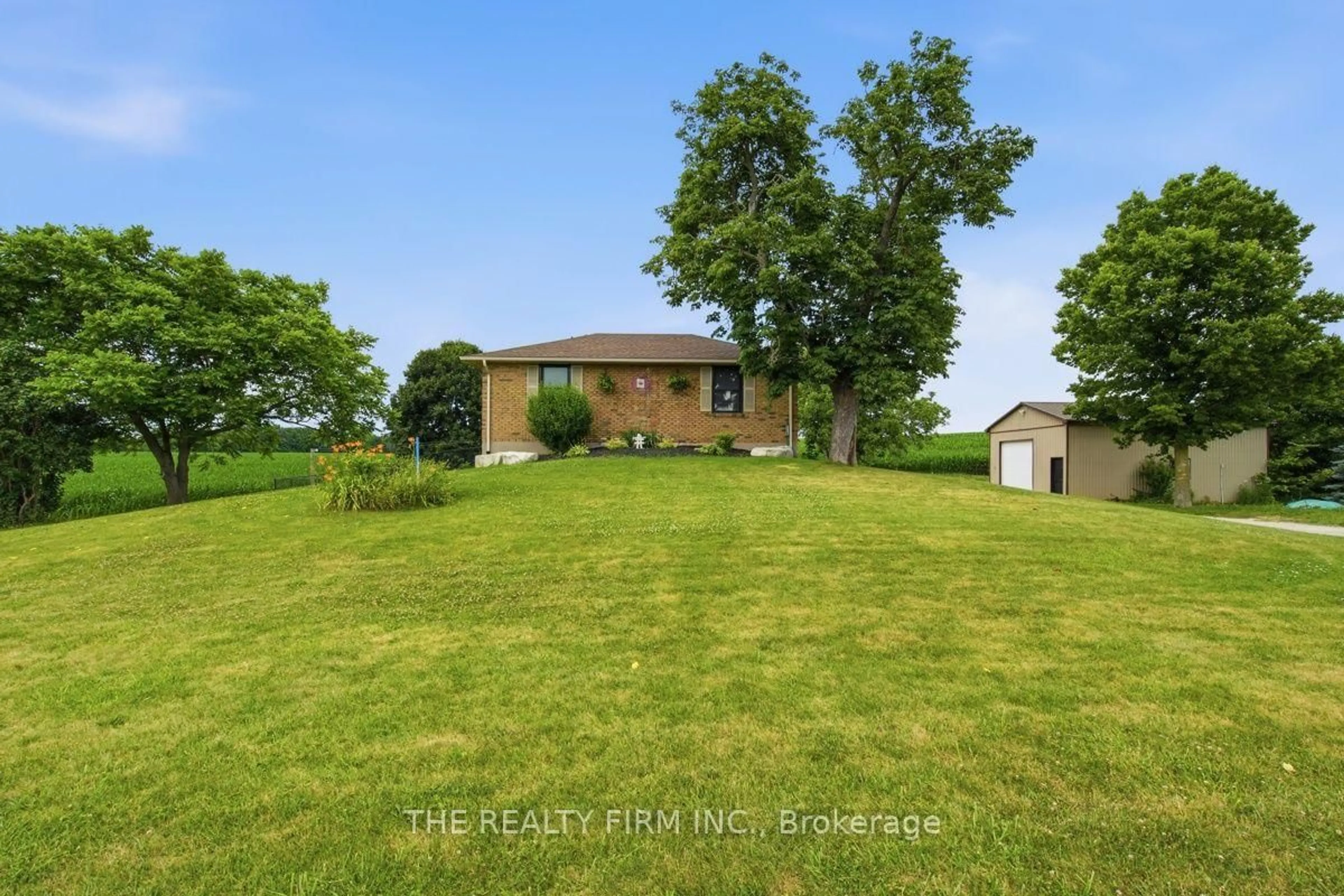 A pic from outside/outdoor area/front of a property/back of a property/a pic from drone, water/lake/river/ocean view for 808 Elginfield Rd, North Middlesex Ontario N0M 2K0