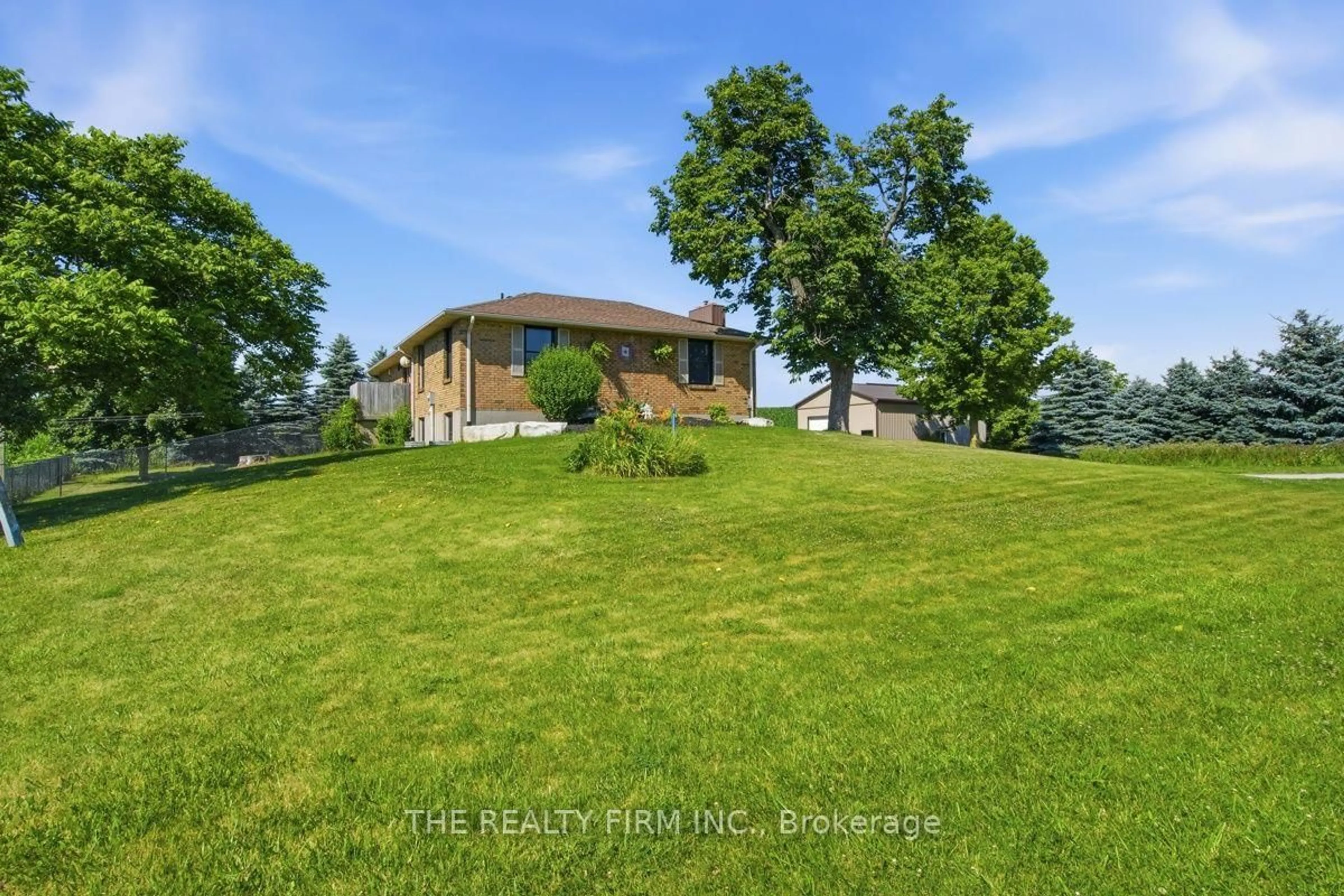 A pic from outside/outdoor area/front of a property/back of a property/a pic from drone, water/lake/river/ocean view for 808 Elginfield Rd, North Middlesex Ontario N0M 2K0
