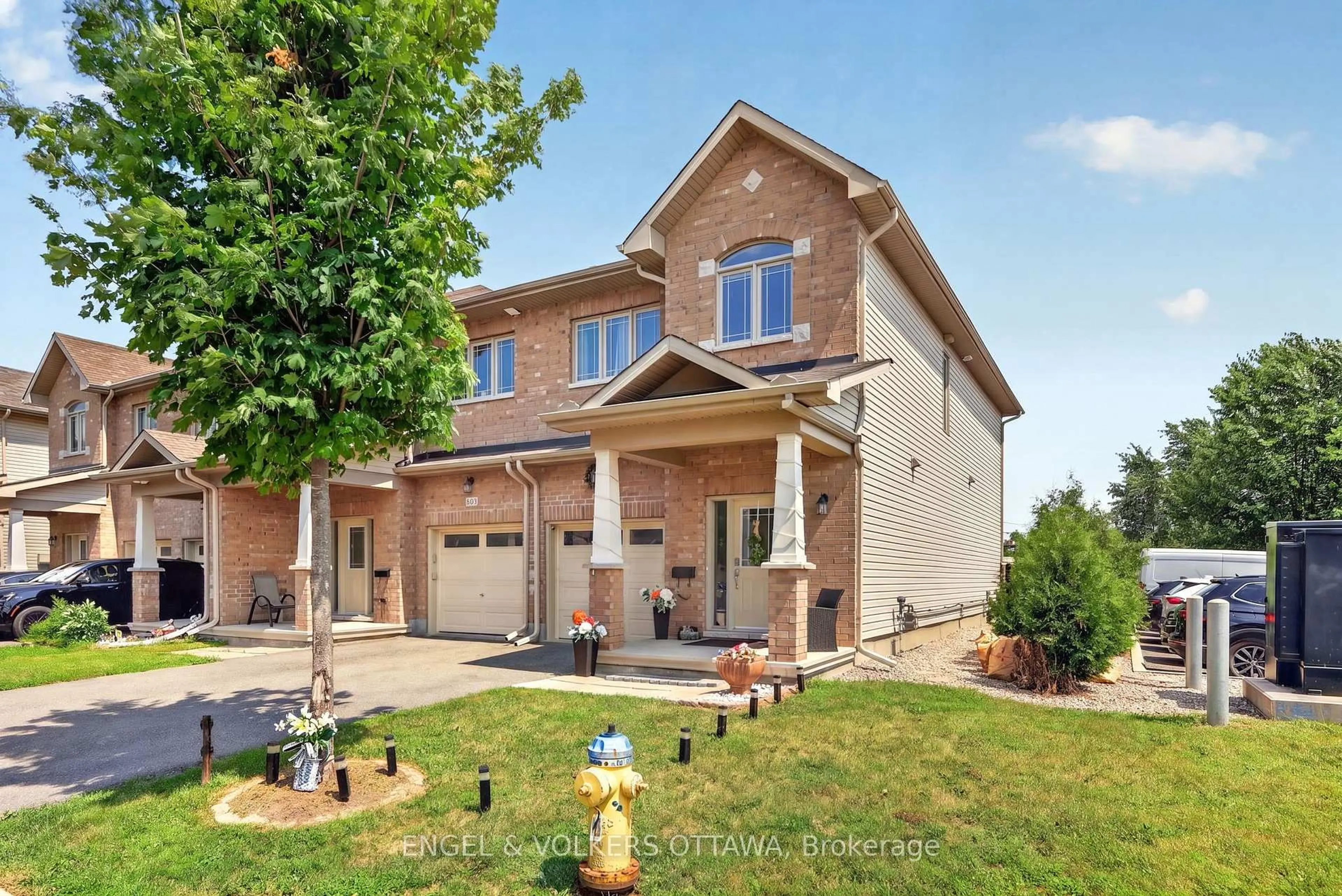 Home with brick exterior material, street for 601 Via Campanale Ave, Ottawa Ontario K2J 4A2