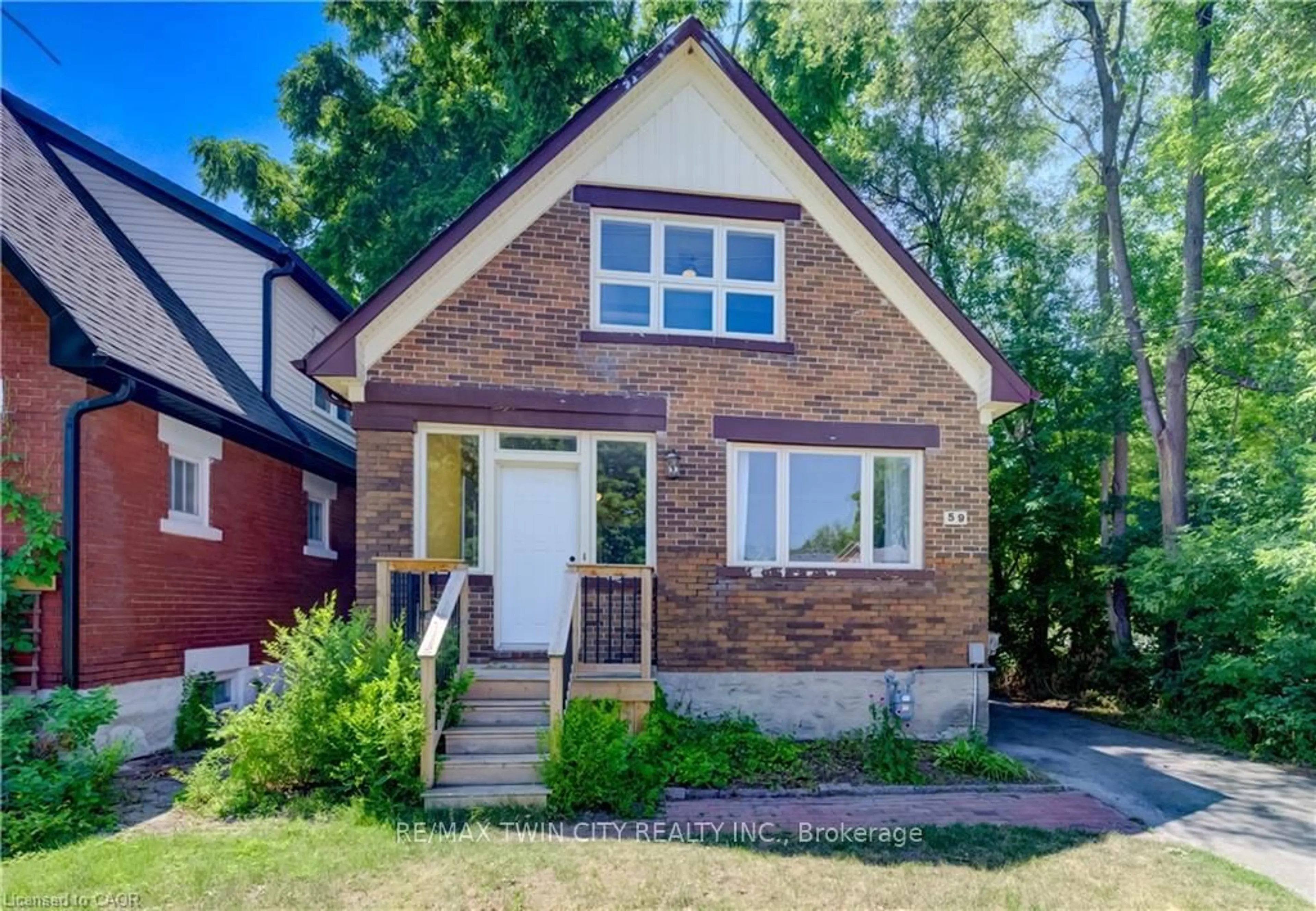 Home with brick exterior material, street for 59 WEST Ave, Kitchener Ontario N2M 1X4