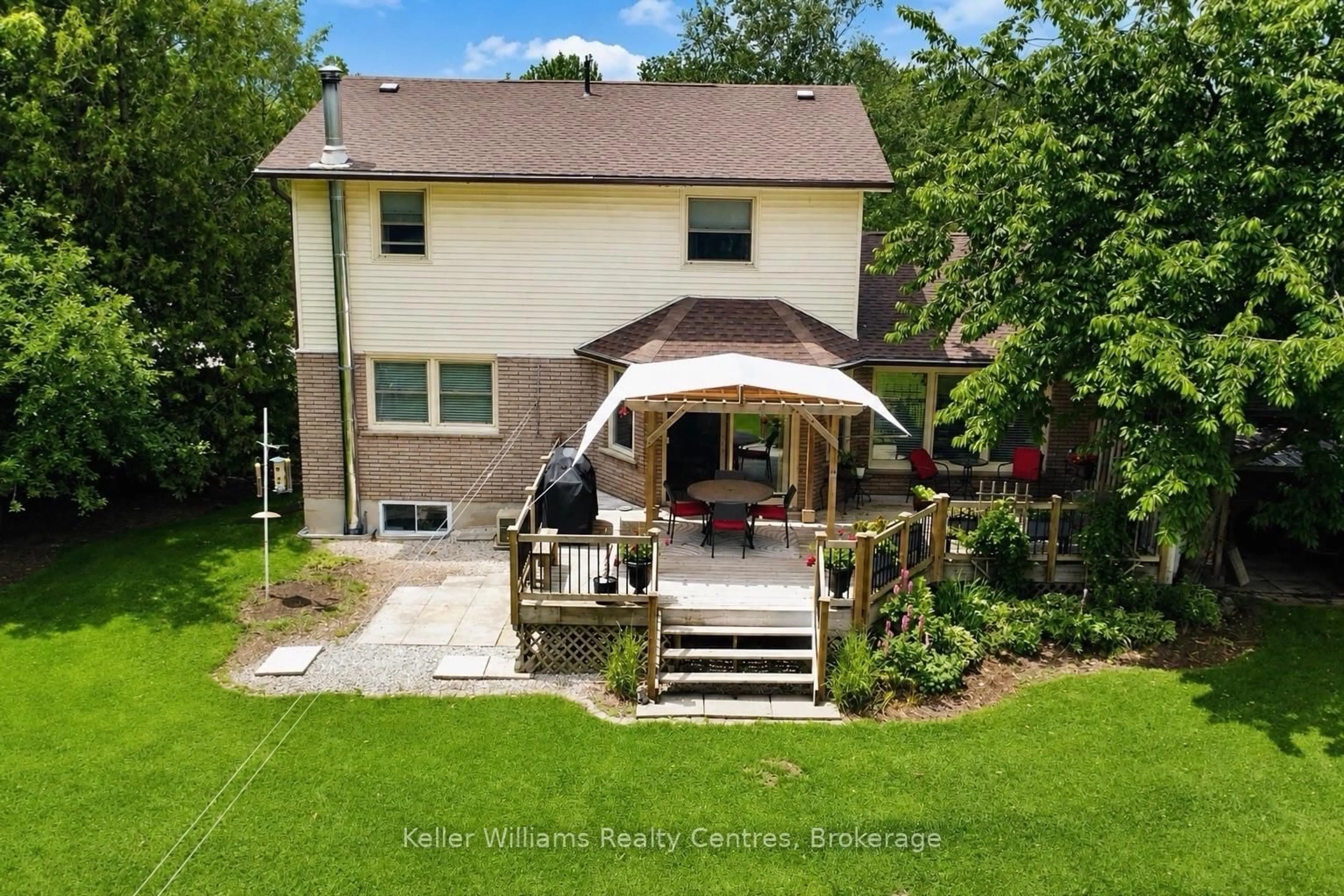 A pic from outside/outdoor area/front of a property/back of a property/a pic from drone, street for 129 Country Lane Rd, West Grey Ontario N0G 1S0