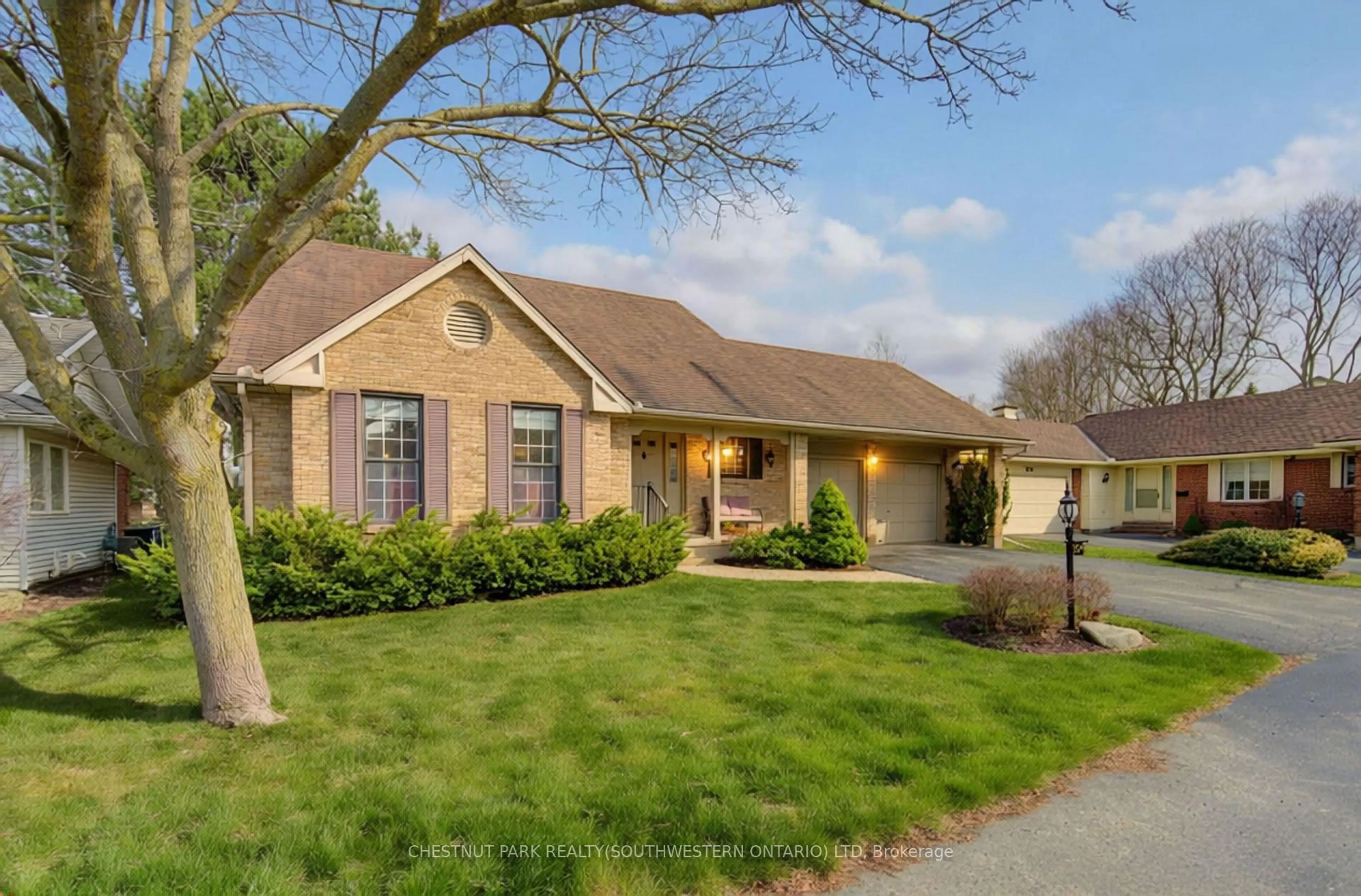Home with brick exterior material, street for 306 Roxton Dr #9, Waterloo Ontario N2T 1R6