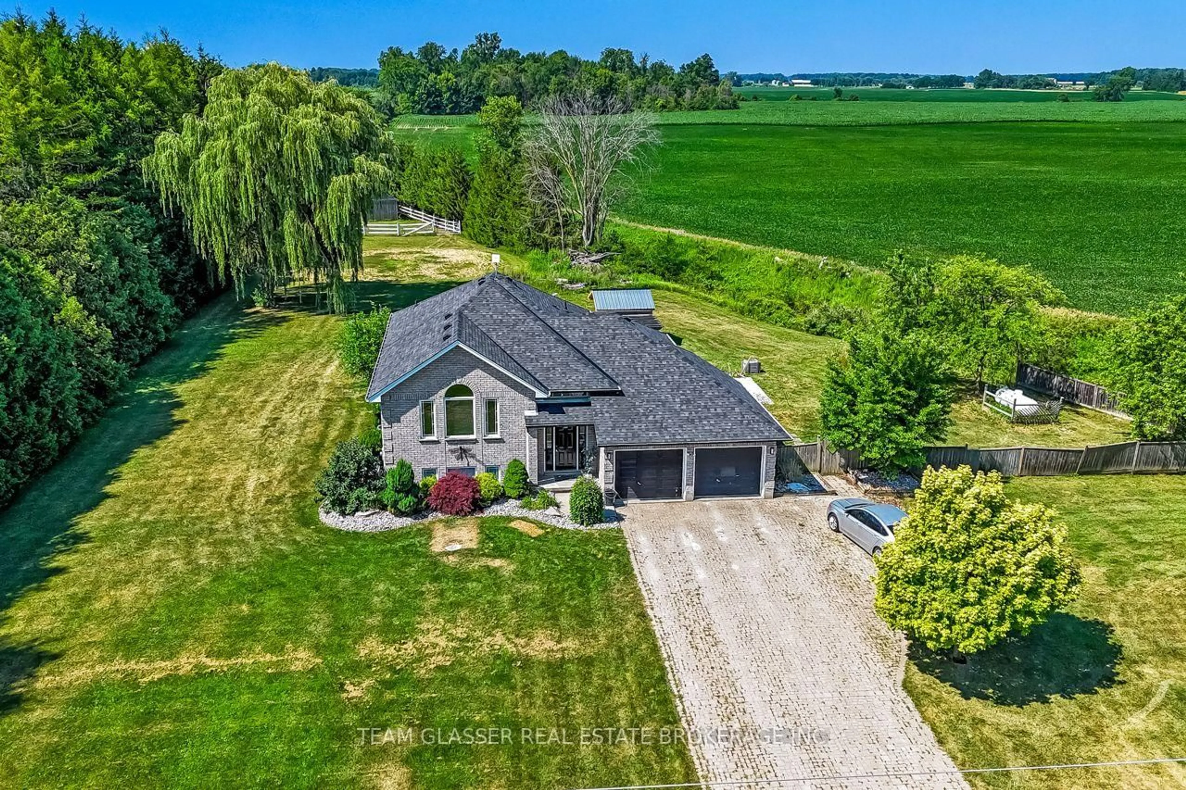 A pic from outside/outdoor area/front of a property/back of a property/a pic from drone, water/lake/river/ocean view for 23999 Mayfair Rd, Adelaide Metcalfe Ontario N7G 3H4