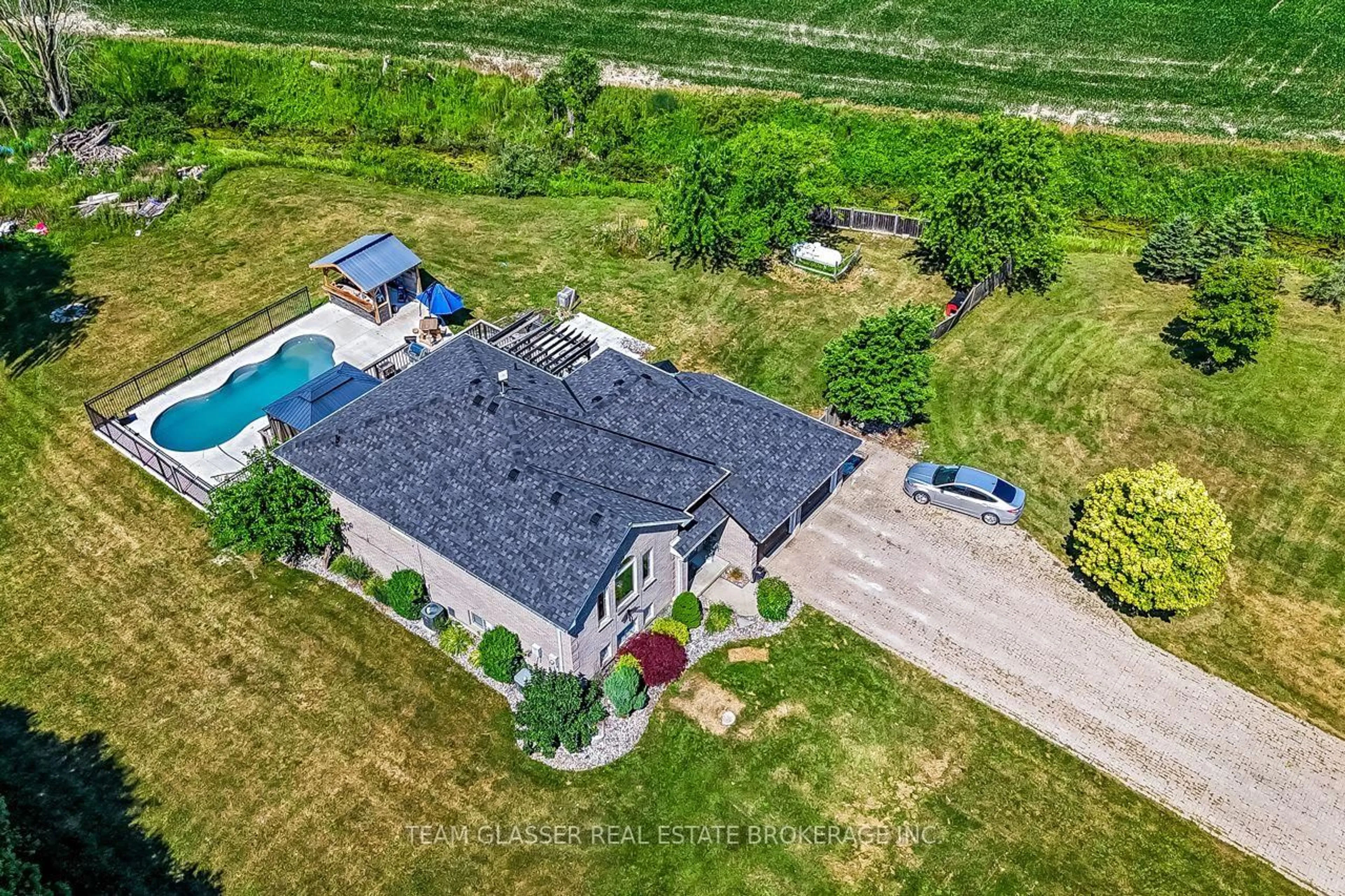 A pic from outside/outdoor area/front of a property/back of a property/a pic from drone, unknown for 23999 Mayfair Rd, Adelaide Metcalfe Ontario N7G 3H4
