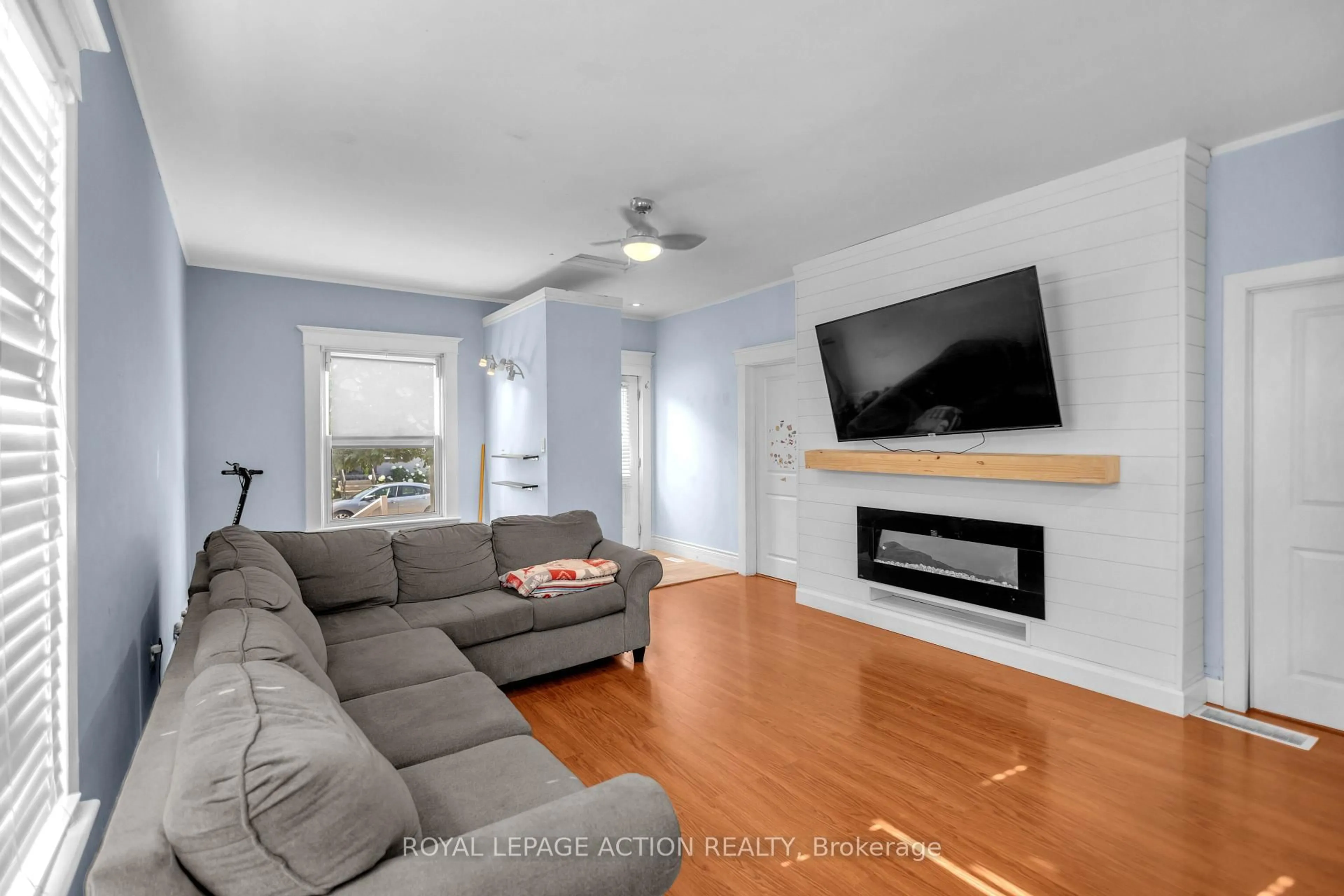 Living room with furniture, wood/laminate floor for 55 Aberdeen Ave, Brantford Ontario N3S 1R7
