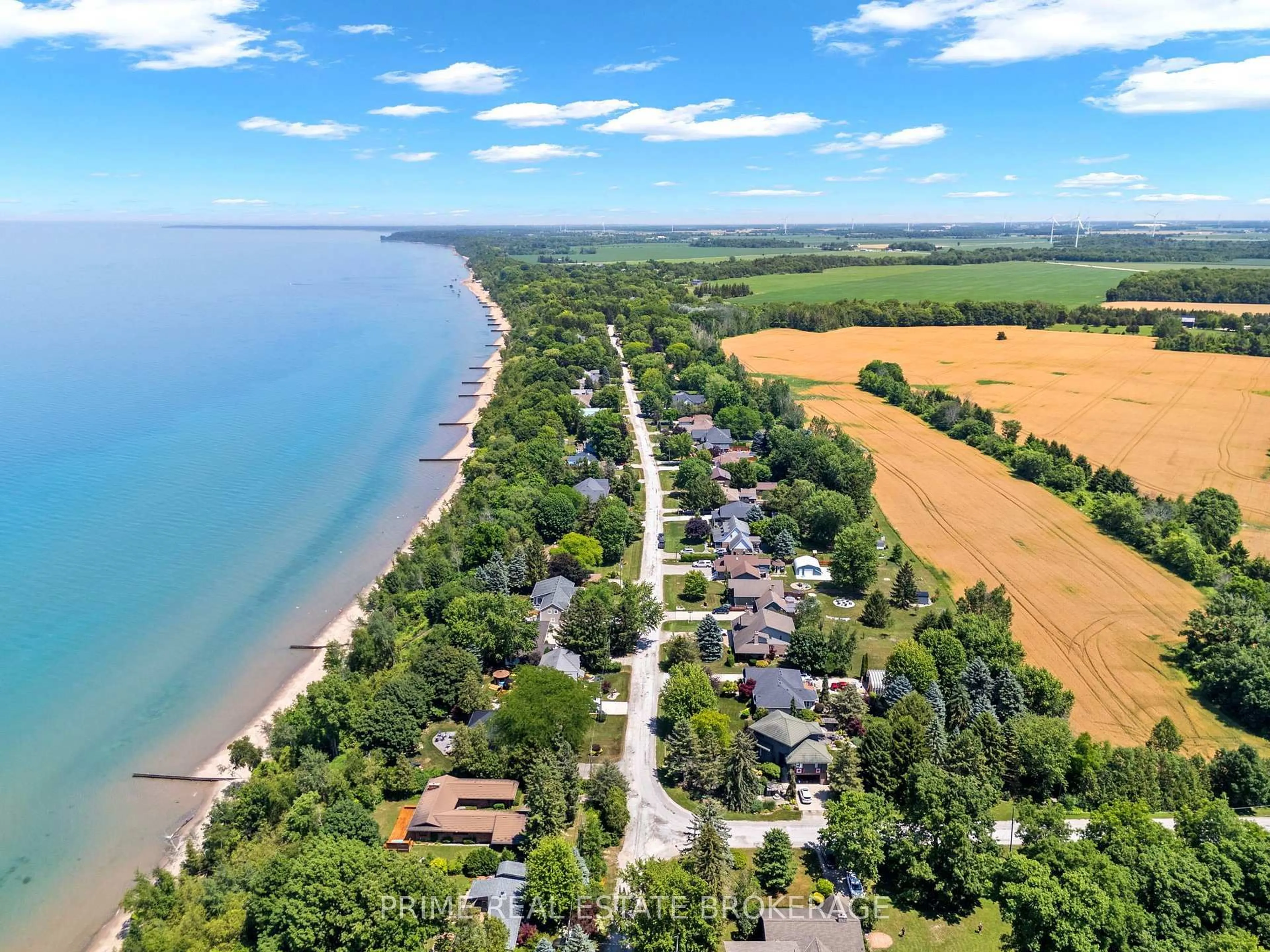 A pic from outside/outdoor area/front of a property/back of a property/a pic from drone, water/lake/river/ocean view for 4710 Lakeside St, Plympton-Wyoming Ontario N0N 1J6