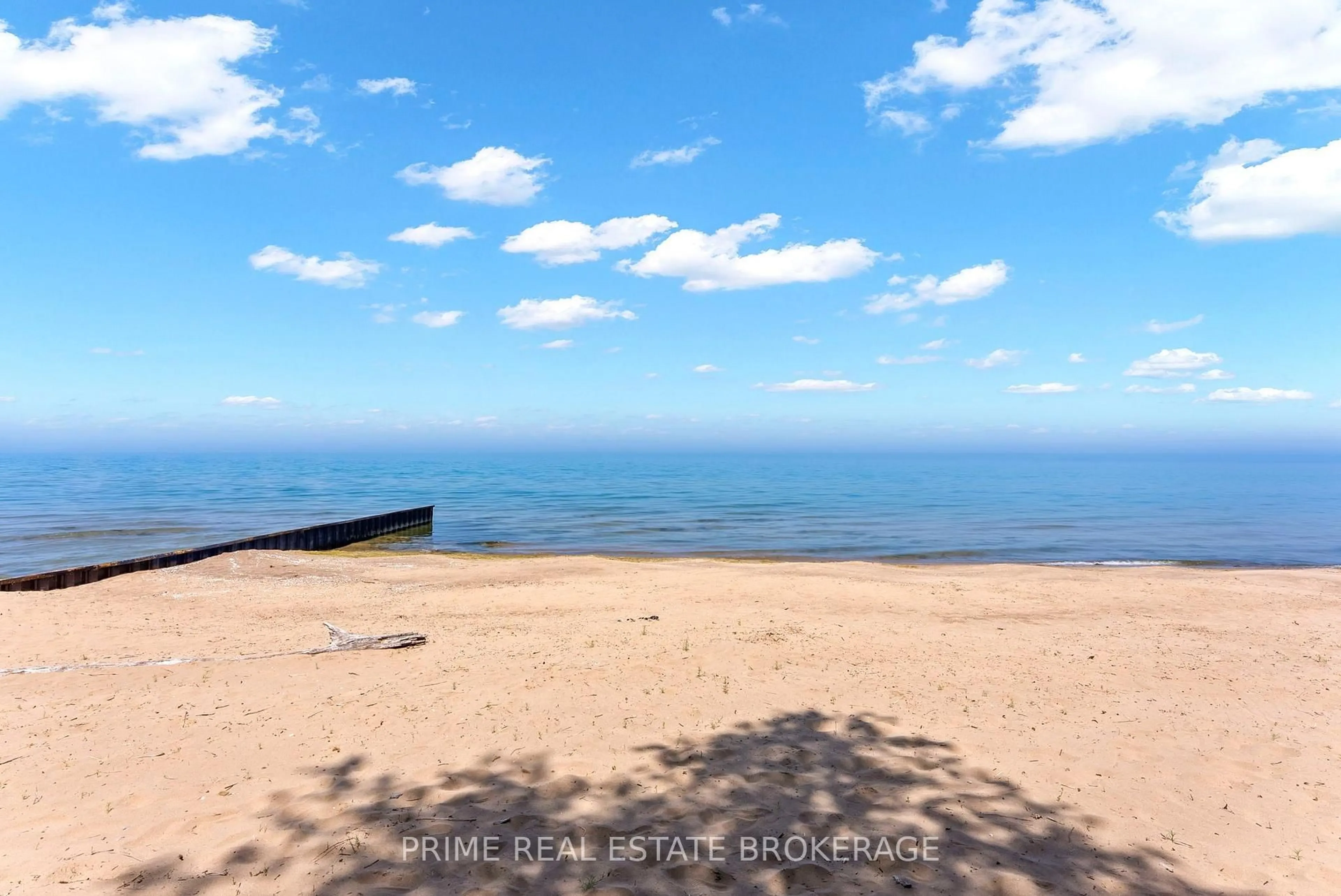 A pic from outside/outdoor area/front of a property/back of a property/a pic from drone, water/lake/river/ocean view for 4710 Lakeside St, Plympton-Wyoming Ontario N0N 1J6