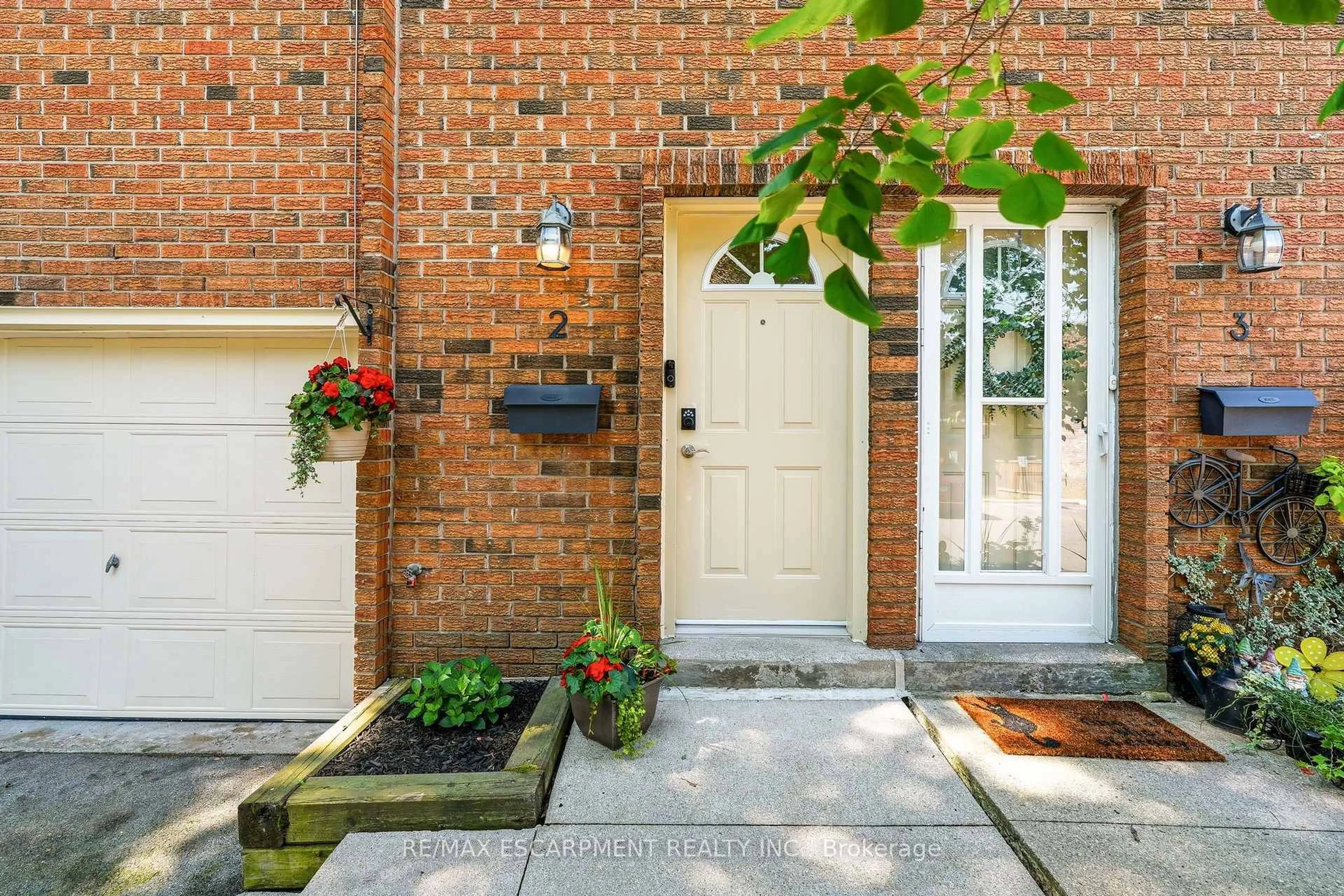 Home with brick exterior material, street for 125 Bonaventure Dr #2, Hamilton Ontario L9C 5Y9