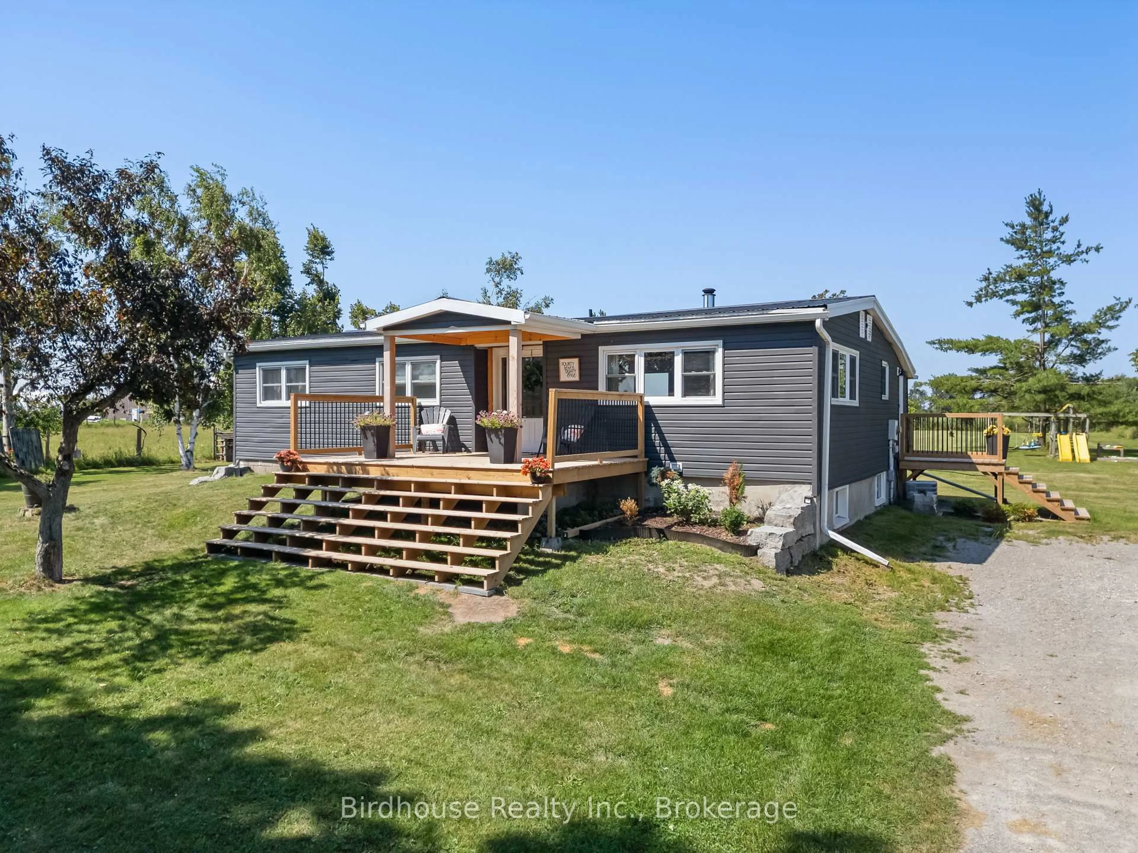 A pic from outside/outdoor area/front of a property/back of a property/a pic from drone, unknown for 4781 Highway 35, Kawartha Lakes Ontario K0M 1G0