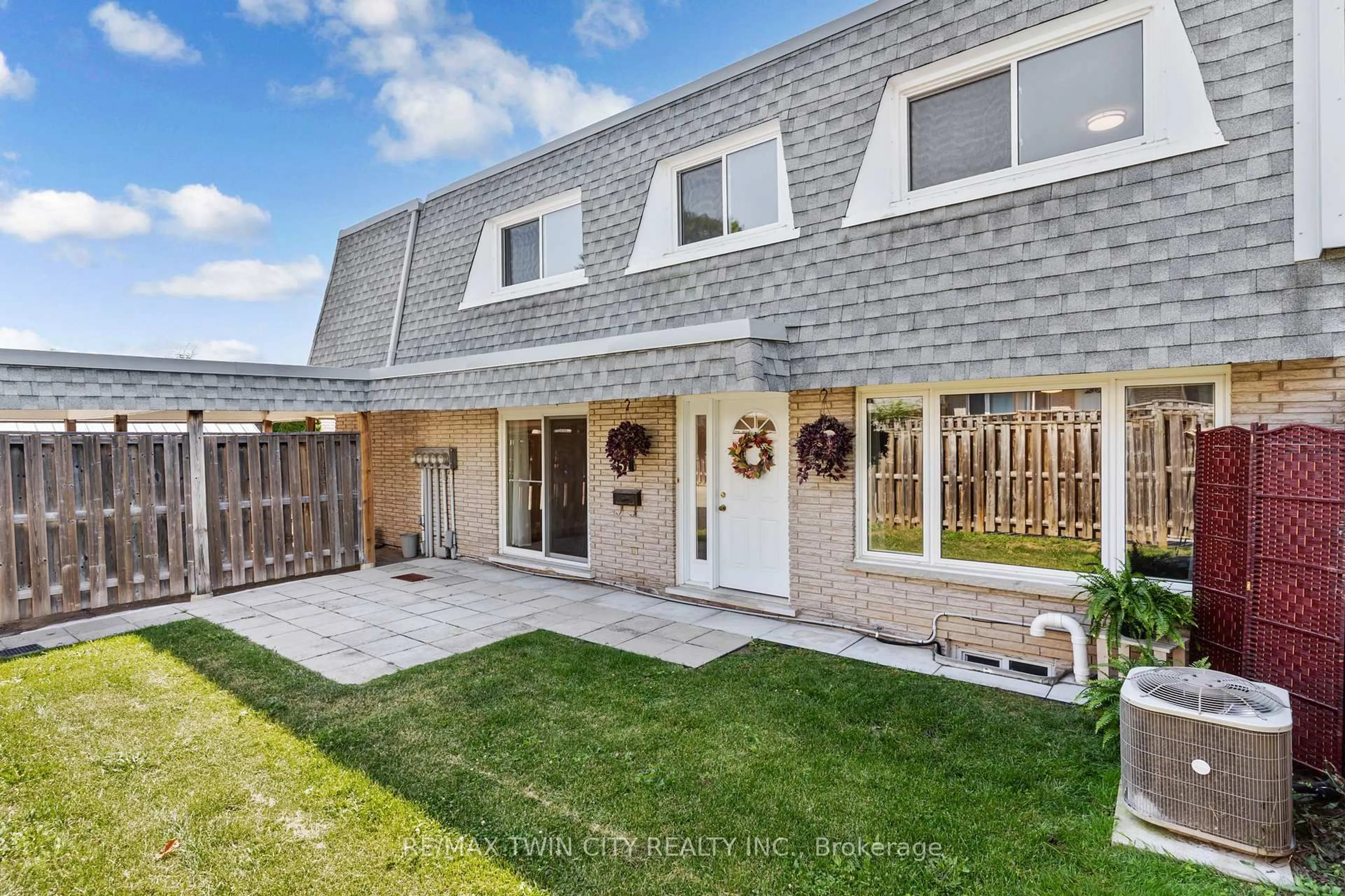 A pic from outside/outdoor area/front of a property/back of a property/a pic from drone, street for 14 Williamsburg Rd #51, Kitchener Ontario N2E 1W1