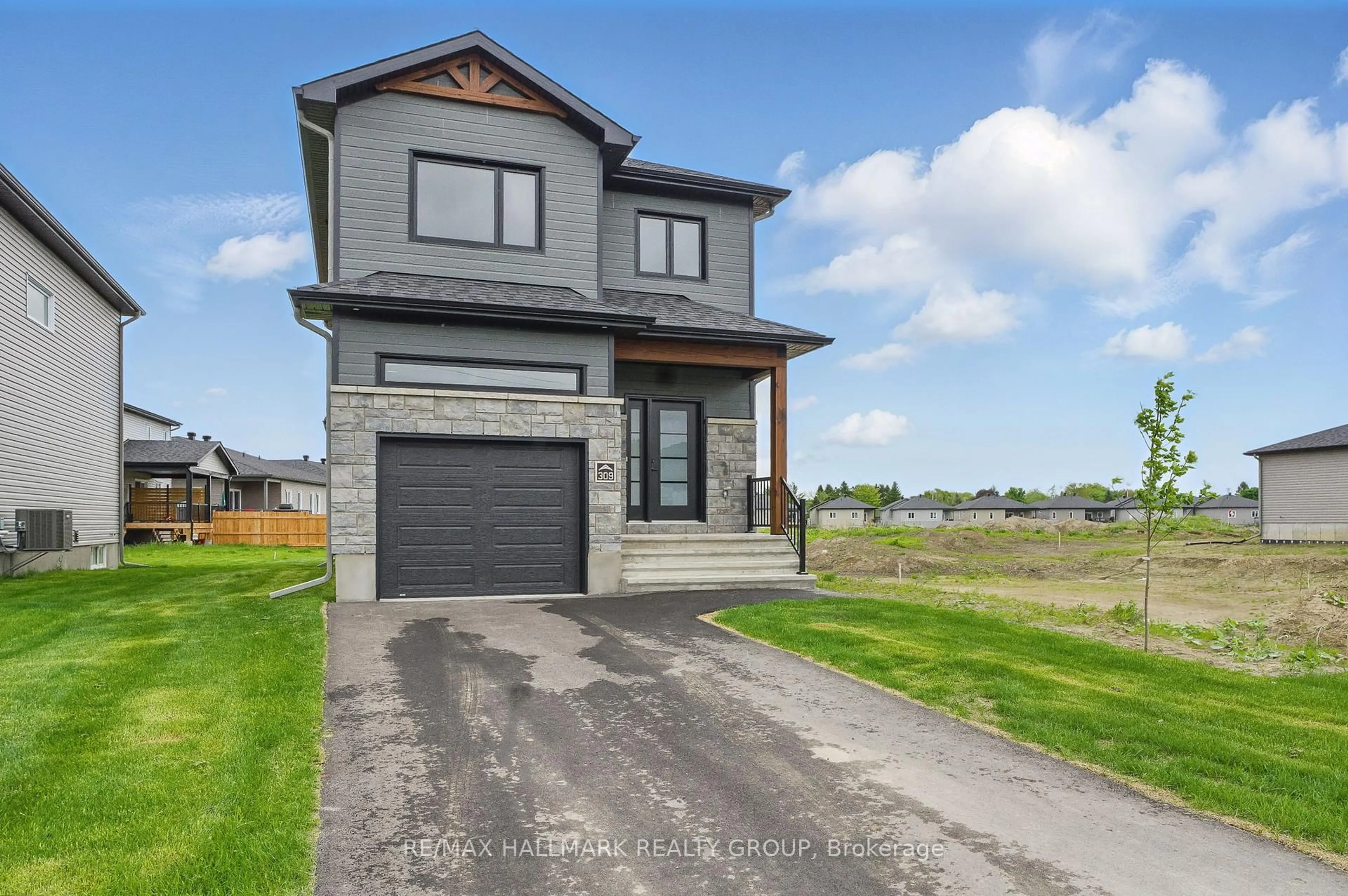 Home with brick exterior material, street for 311 ZAKARI St, Casselman Ontario K0A 1M0