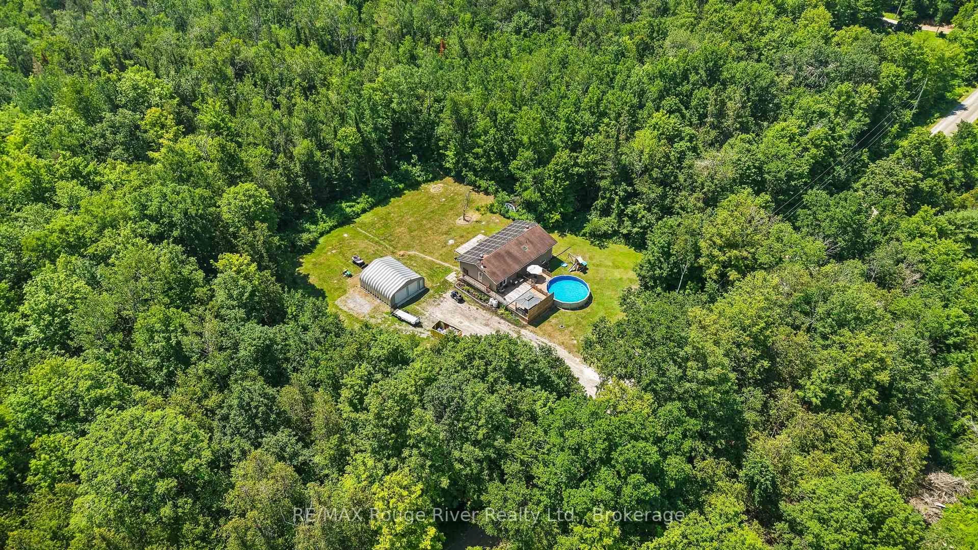 A pic from outside/outdoor area/front of a property/back of a property/a pic from drone, forest/trees view for 472 Callaghan Rapids Rd, Limoges Ontario K0K 2M0