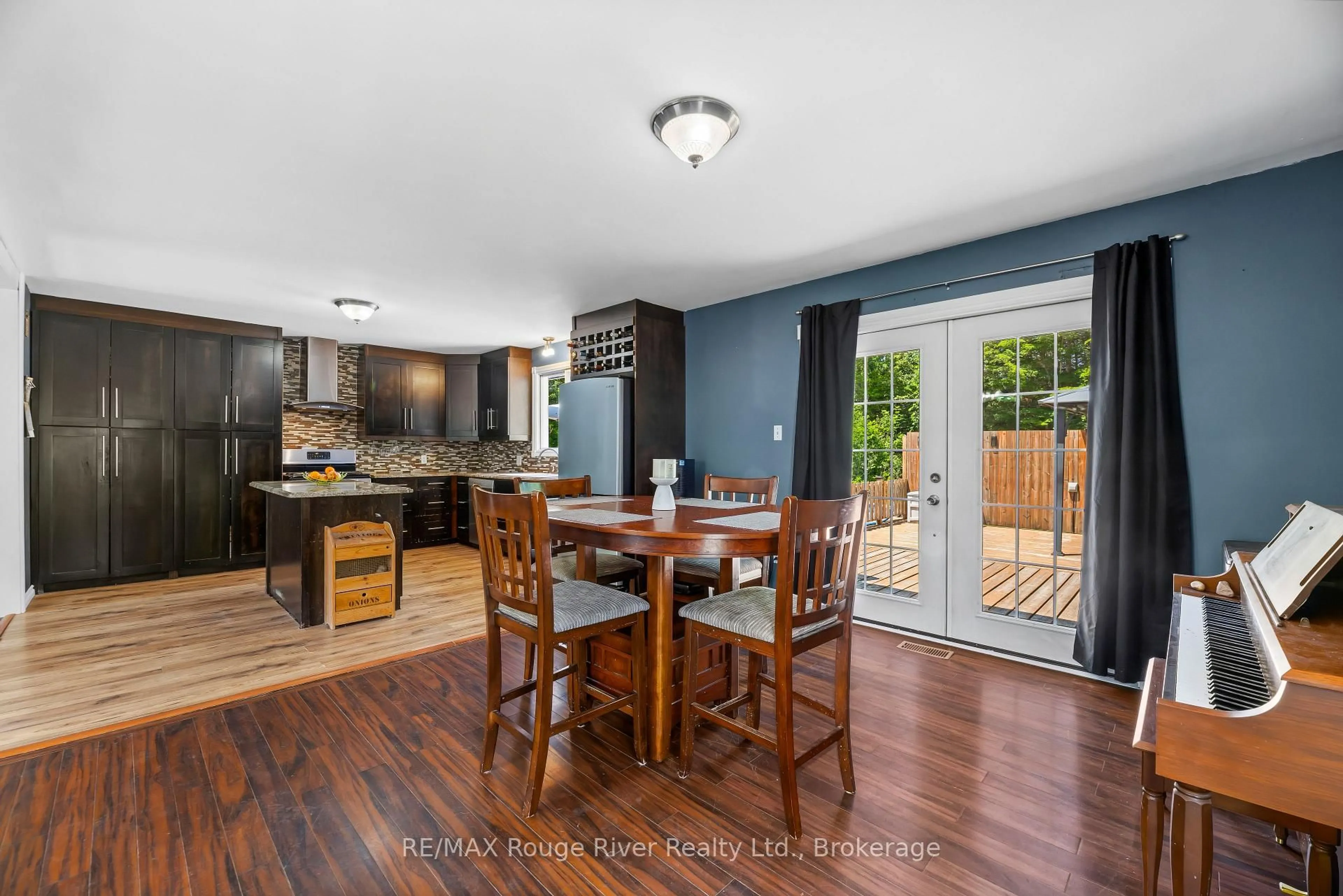 Open concept kitchen, wood/laminate floor for 472 Callaghan Rapids Rd, Limoges Ontario K0K 2M0
