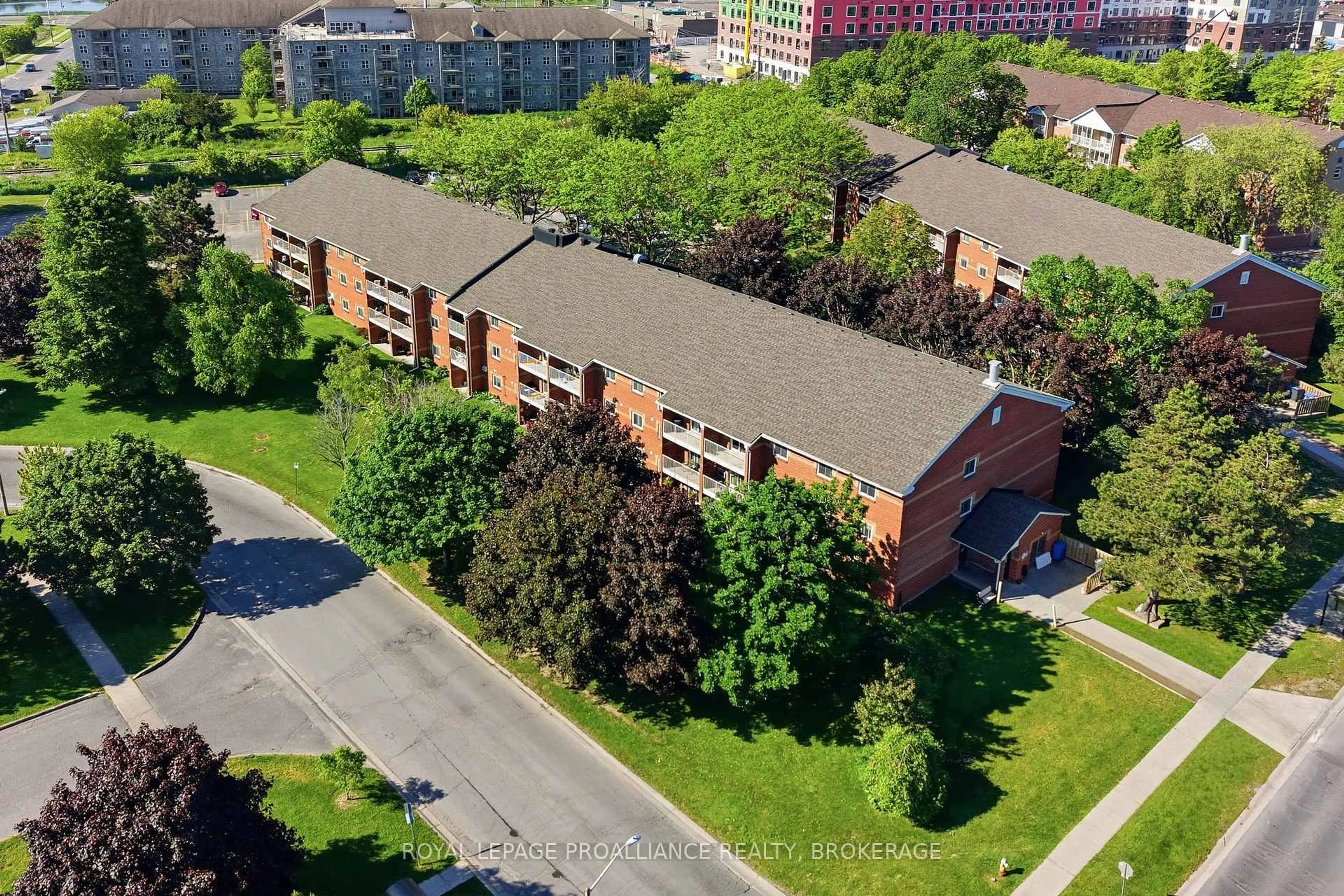 A pic from outside/outdoor area/front of a property/back of a property/a pic from drone, city buildings view from balcony for 573 Armstrong Rd #217, Kingston Ontario K7M 8J8