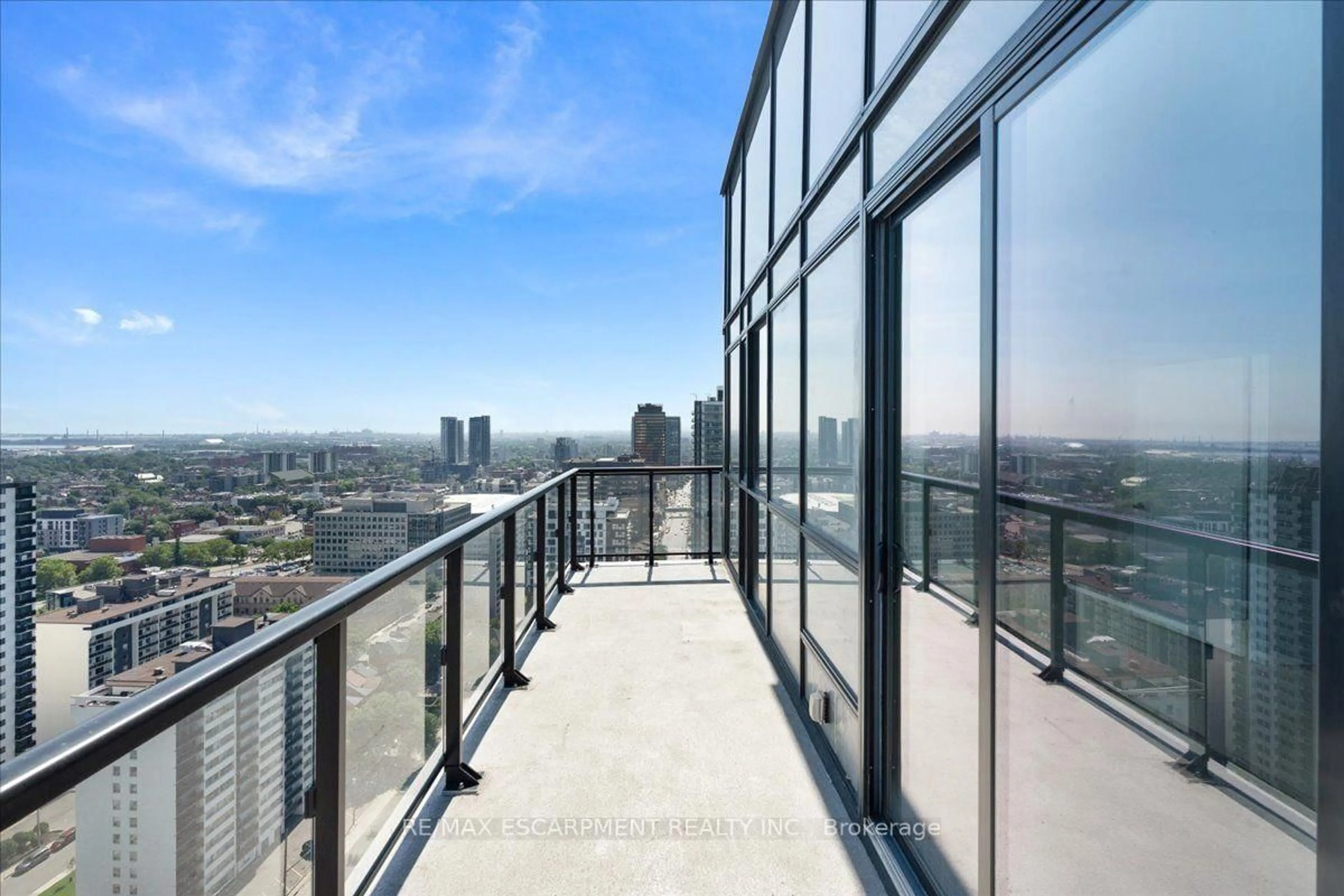 Balcony in the apartment, city buildings view from balcony for 15 Queen St #2309, Hamilton Ontario L8P 3R6