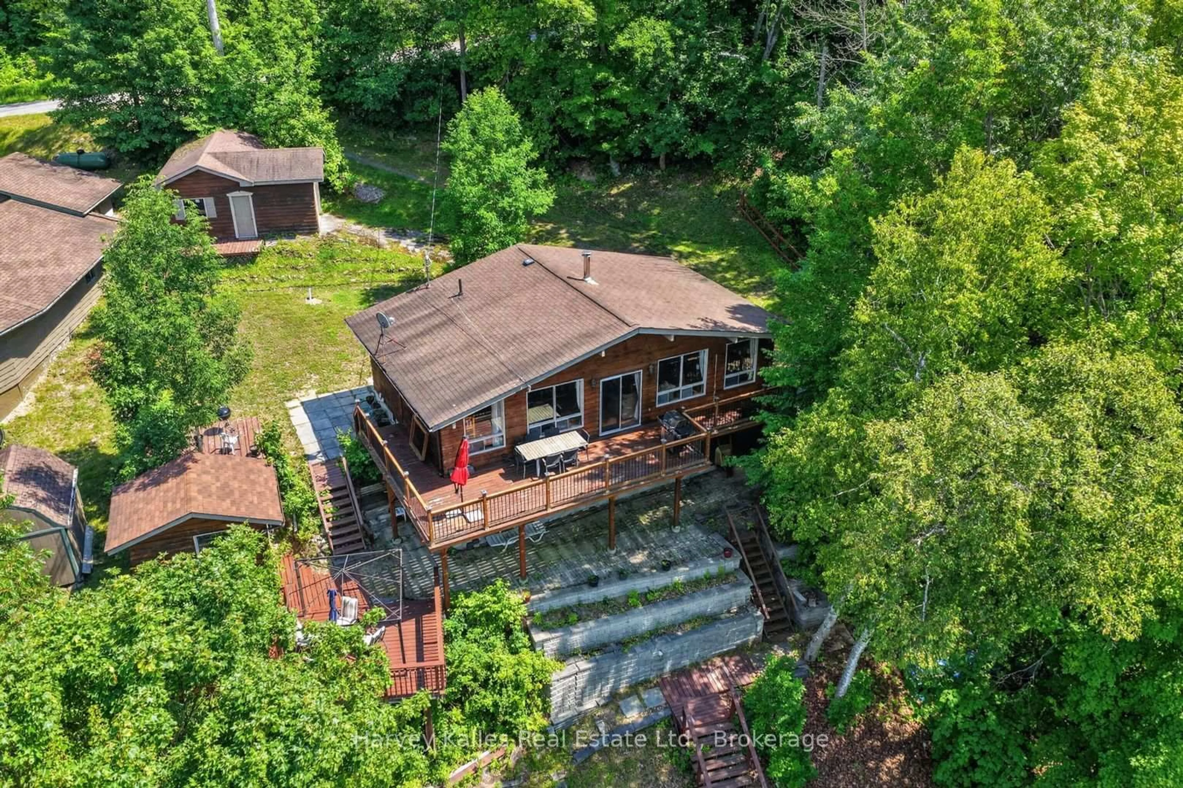 A pic from outside/outdoor area/front of a property/back of a property/a pic from drone, unknown for 260 West Point Sands Rd, Huntsville Ontario P1H 2J3