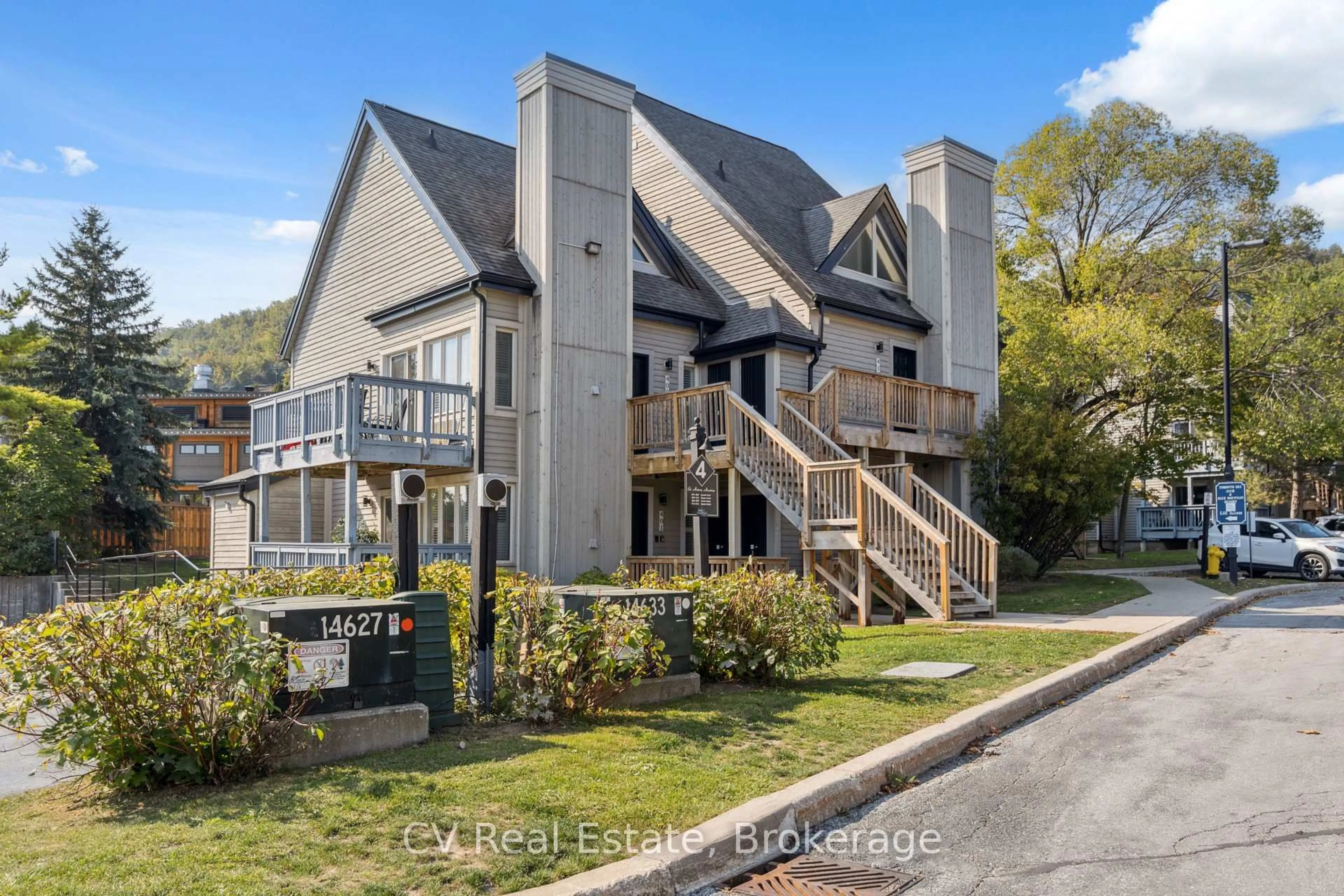 A pic from outside/outdoor area/front of a property/back of a property/a pic from drone, unknown for 796468 Grey 19 Rd #404, Blue Mountains Ontario L9Y 0N6