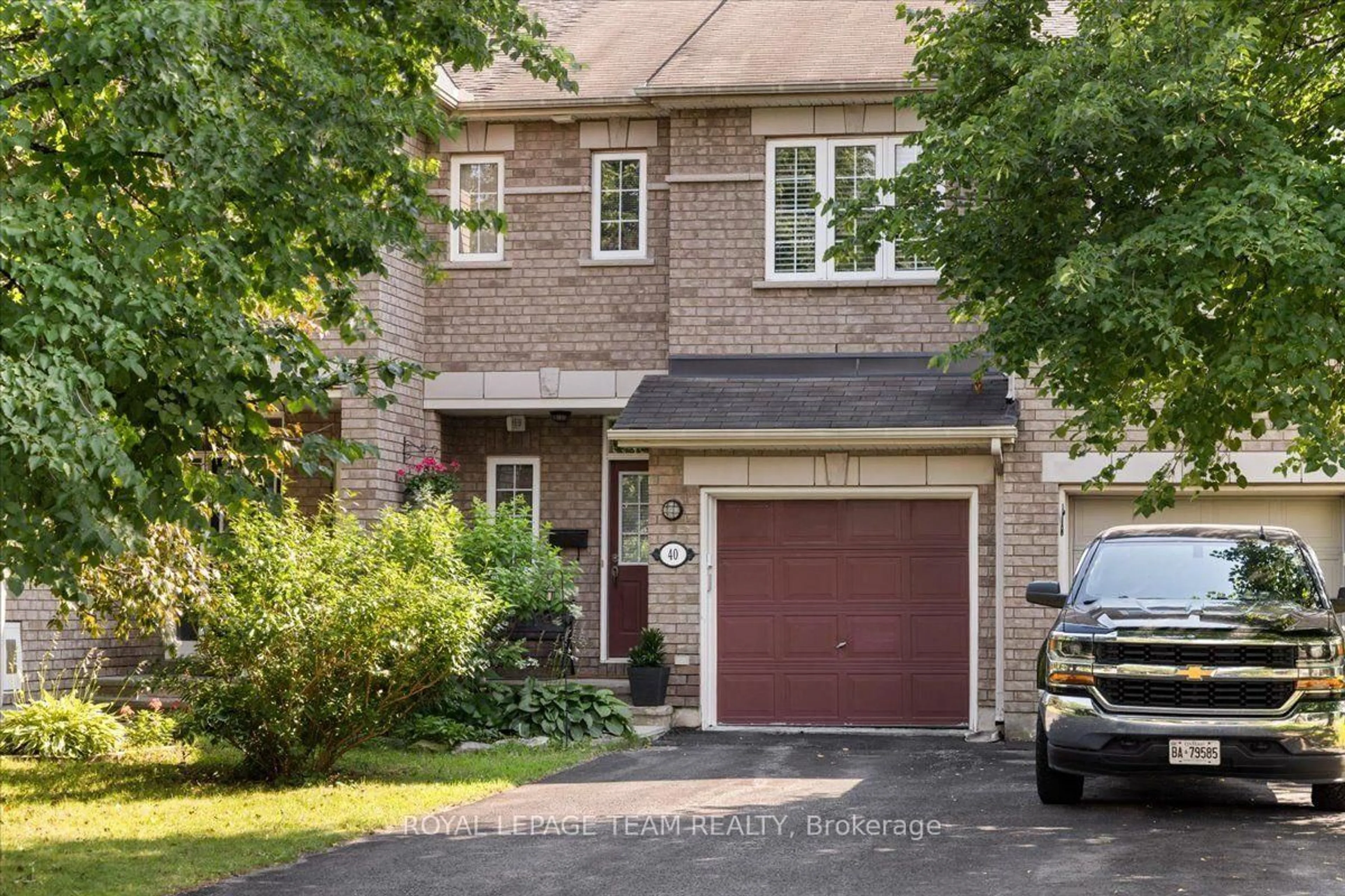 Home with brick exterior material, street for 40 Saddlesmith Circ, Ottawa Ontario K2M 2Y9