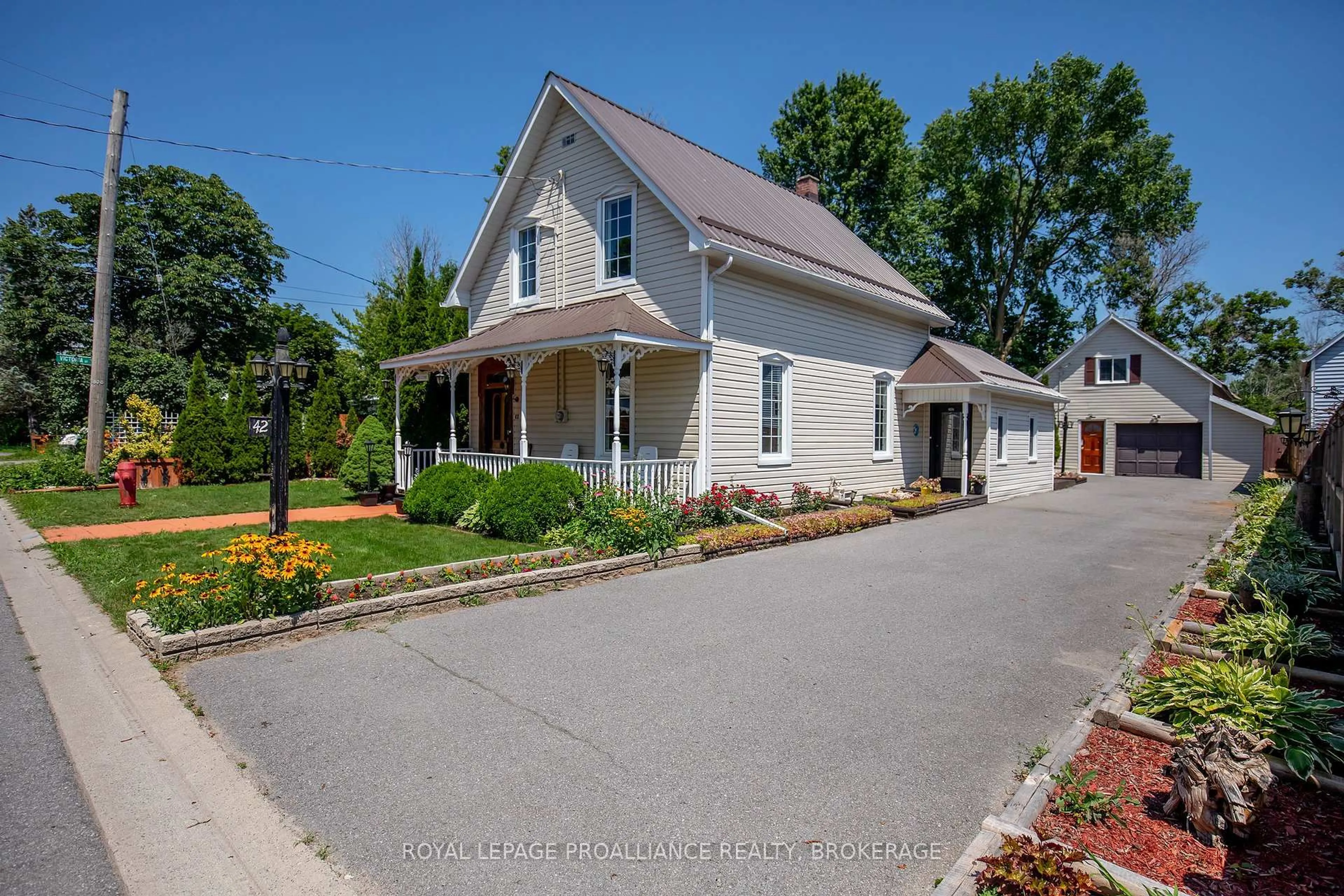 A pic from outside/outdoor area/front of a property/back of a property/a pic from drone, street for 42 Factory St, Bissett Creek Ontario K0H 2H0