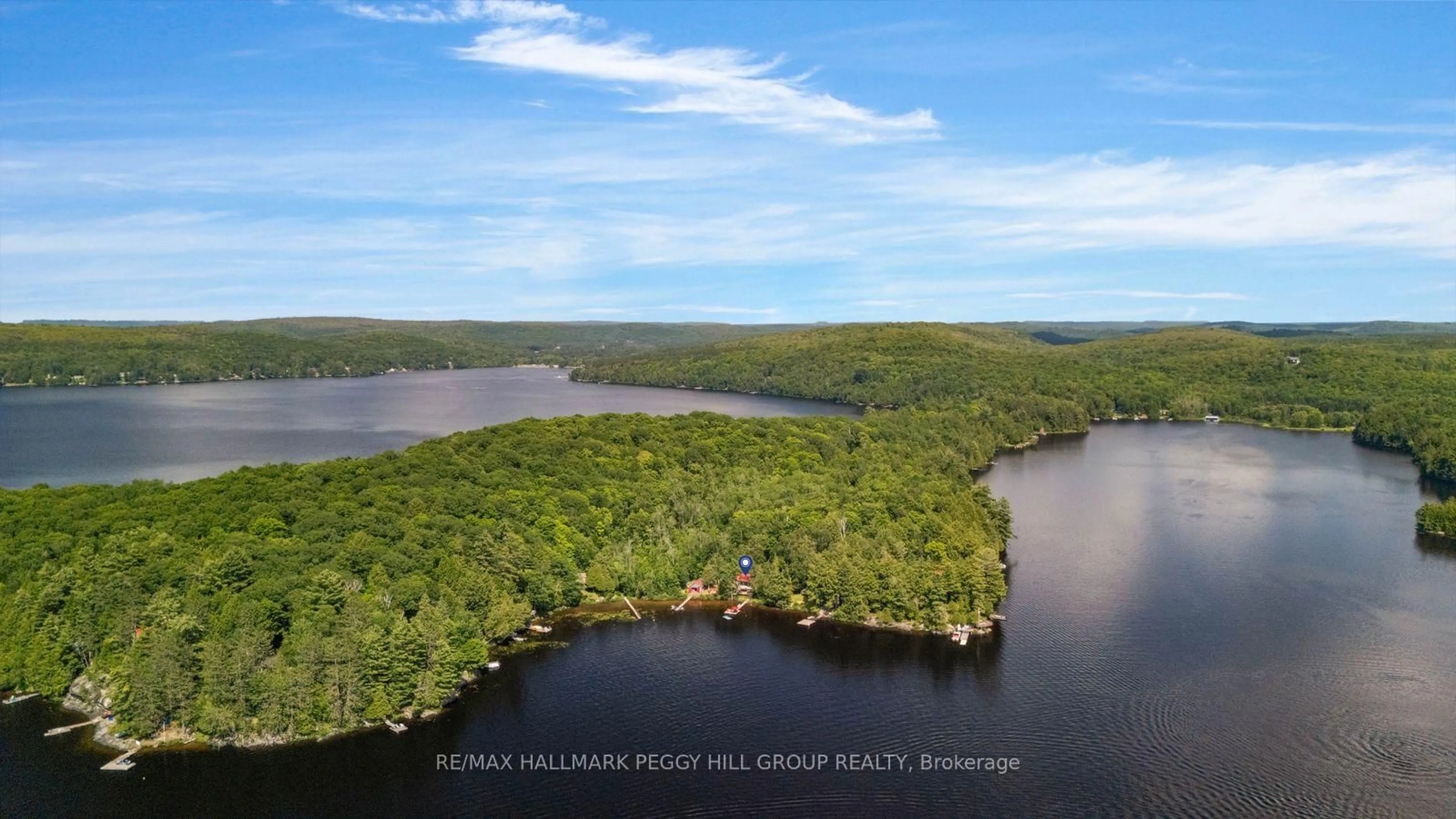 A pic from outside/outdoor area/front of a property/back of a property/a pic from drone, water/lake/river/ocean view for 200 Doe Lake Peninsula, Armour Ontario P0A 1L0