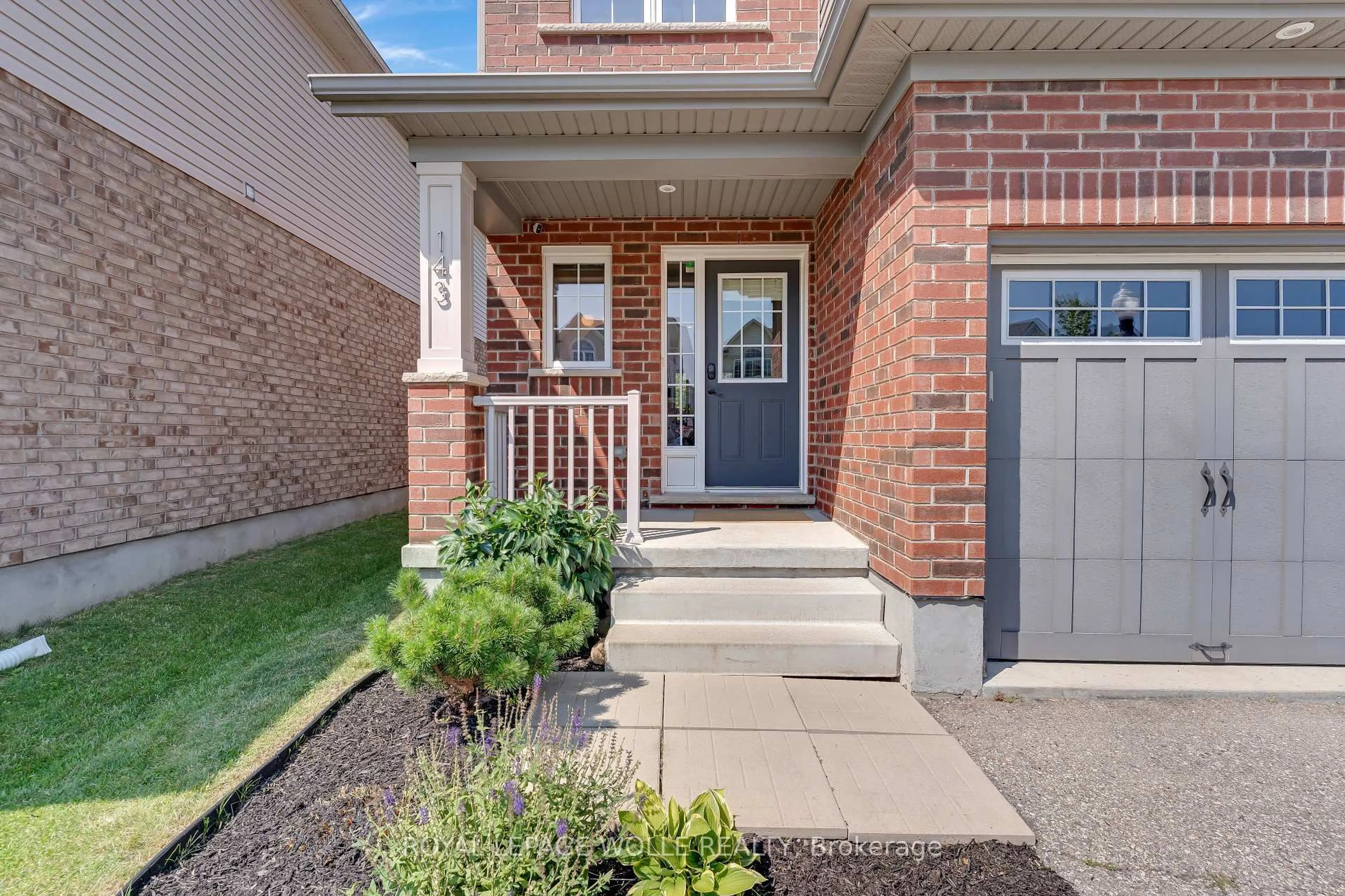 Home with brick exterior material, street for 143 Stillwater St, Kitchener Ontario N2A 0J2