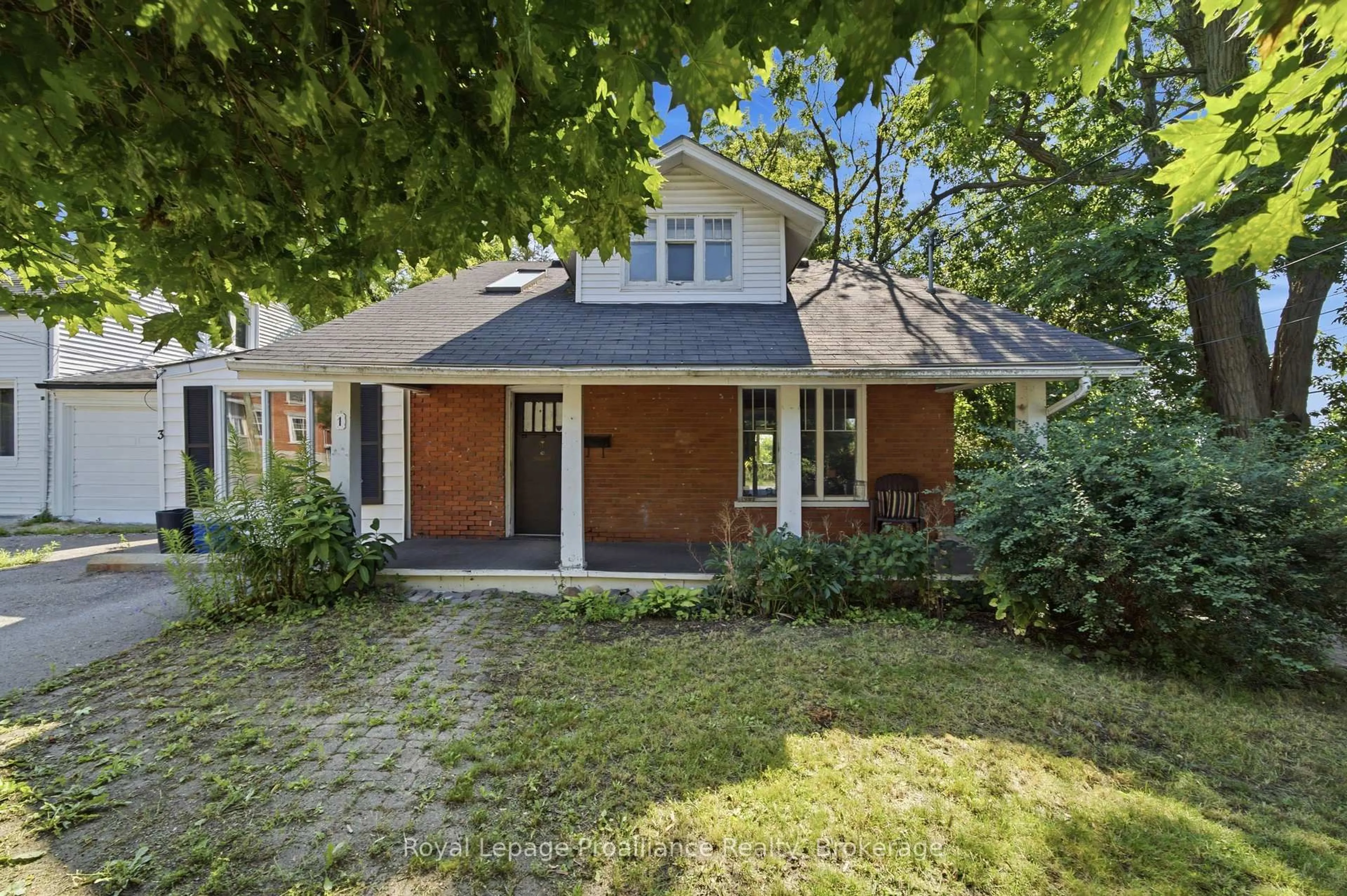 Home with brick exterior material, street for 1 Highland Ave, Belleville Ontario K8P 3P8