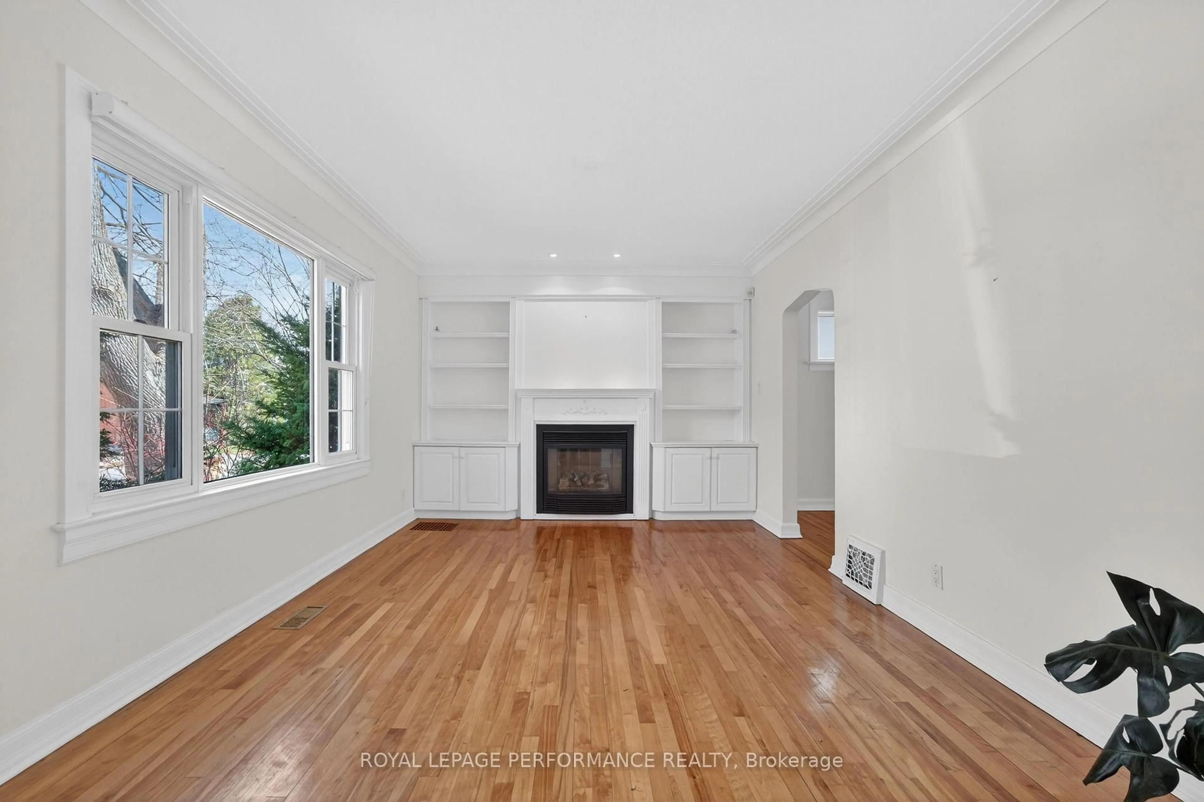 Living room with furniture, wood/laminate floor for 318 Duncairn Ave, Ottawa Ontario K1Z 7G9