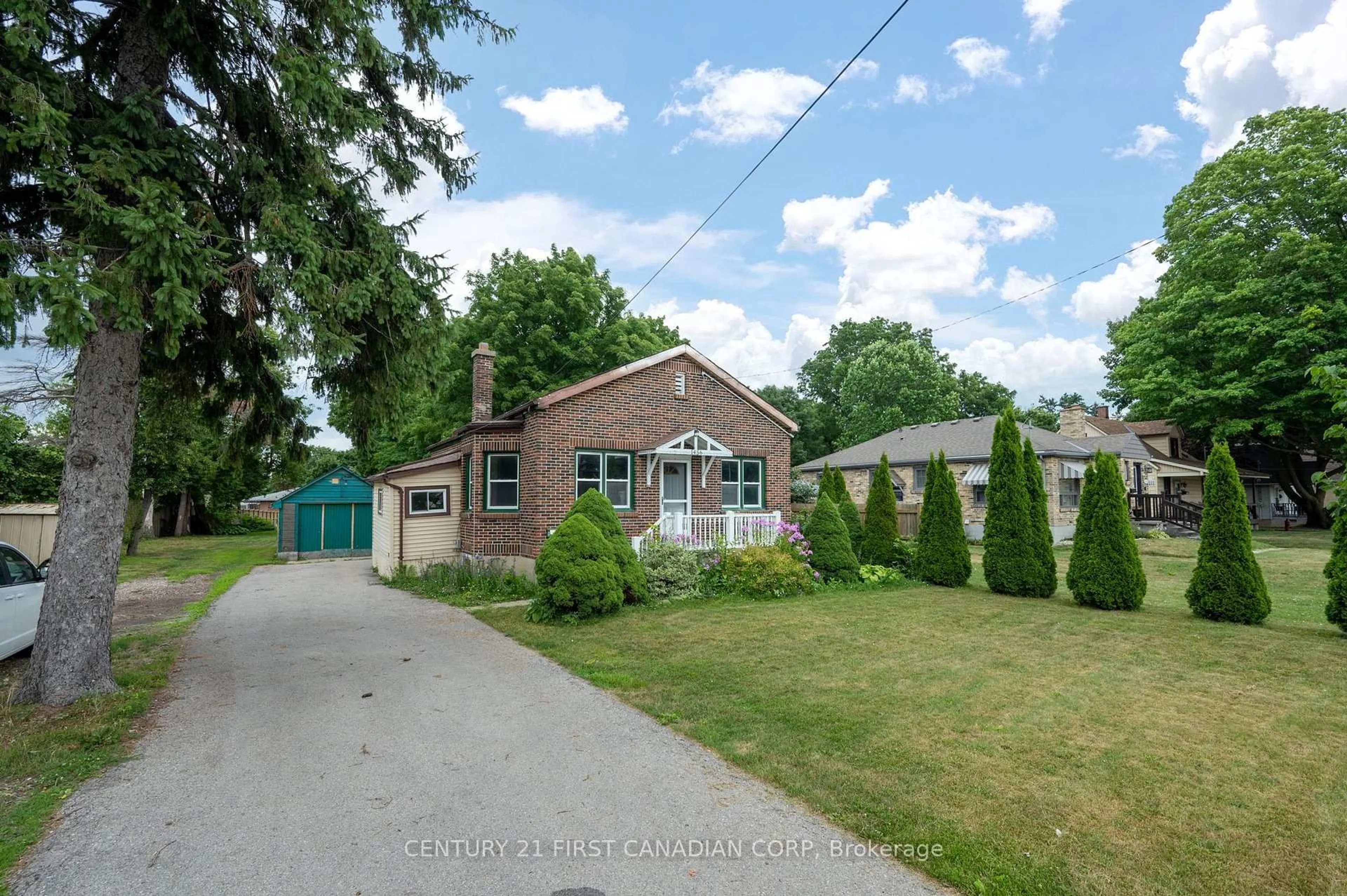 A pic from outside/outdoor area/front of a property/back of a property/a pic from drone, street for 1456 Gore Rd, London East Ontario N5W 1T7