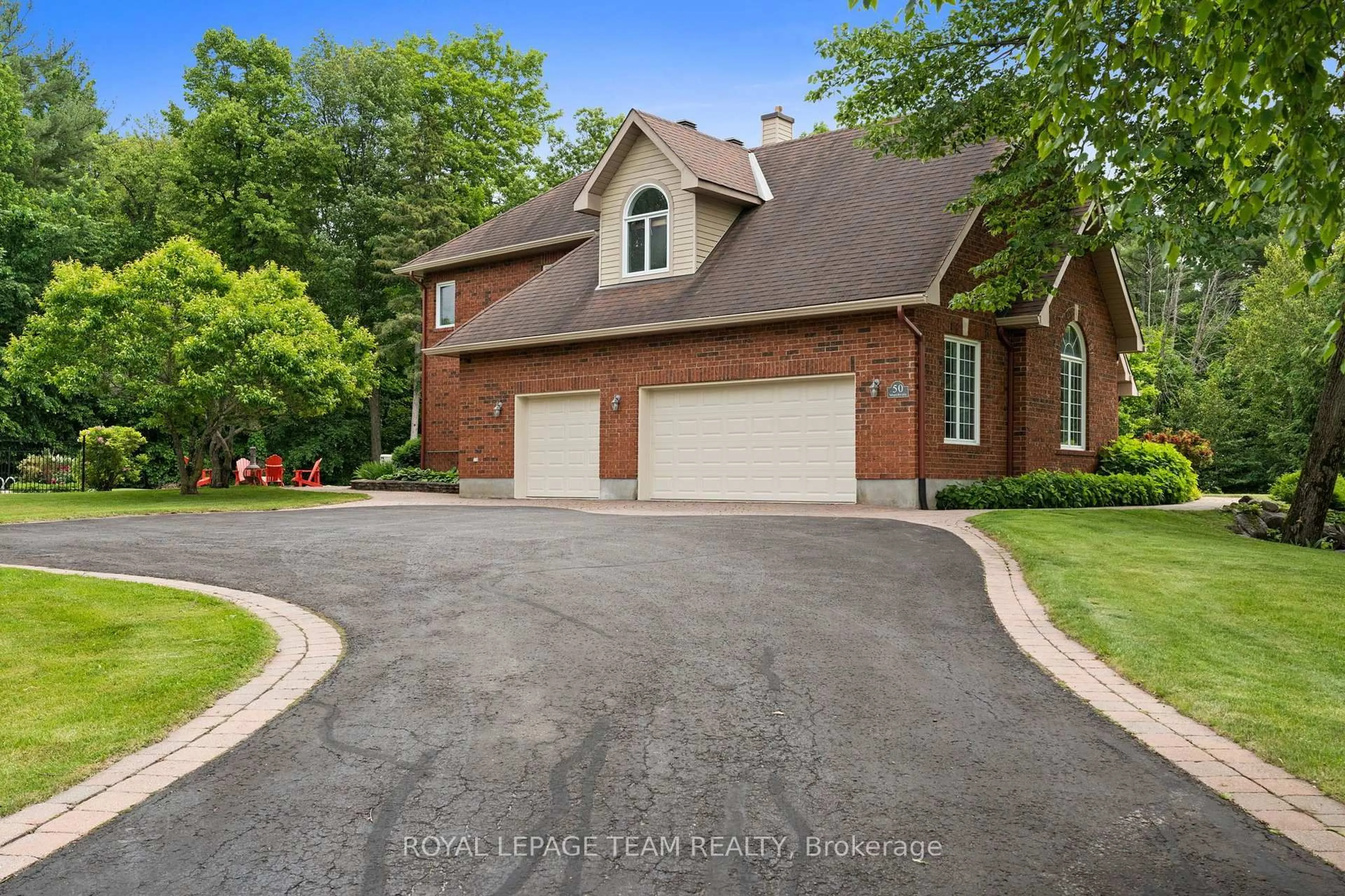 Home with brick exterior material, street for 50 Marchvale Dr, Ottawa Ontario K2W 1C2