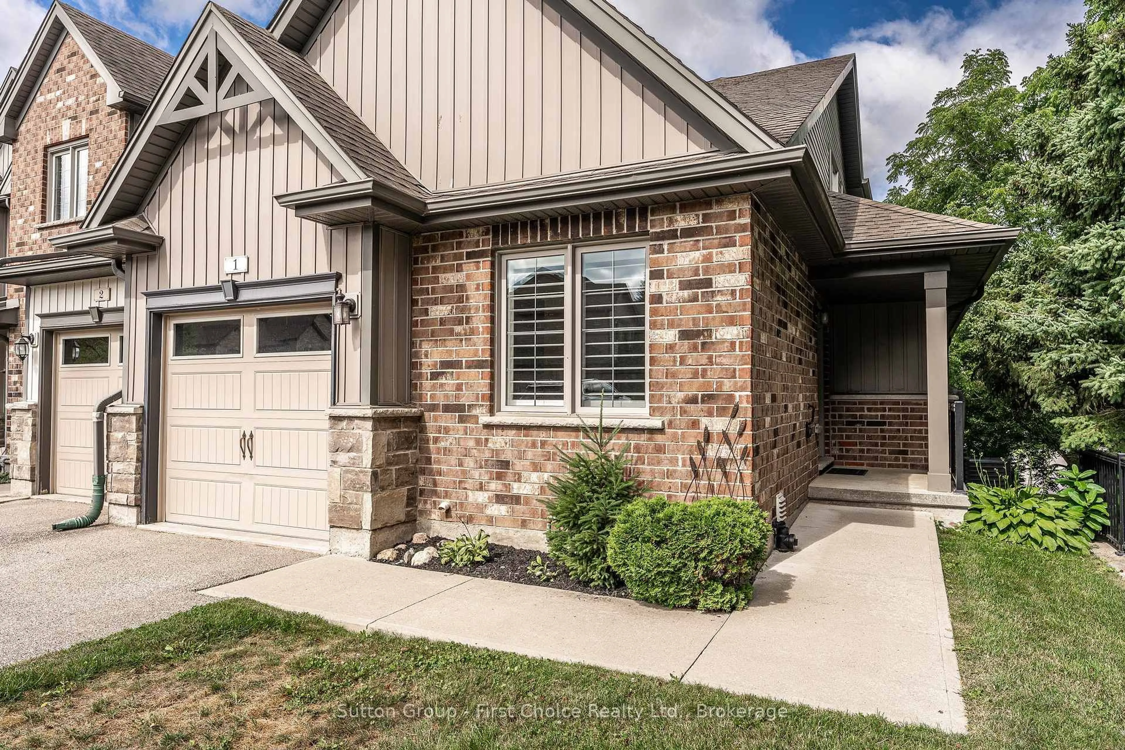 Home with brick exterior material, street for 55 Harrison St #1, Stratford Ontario N5A 0A4