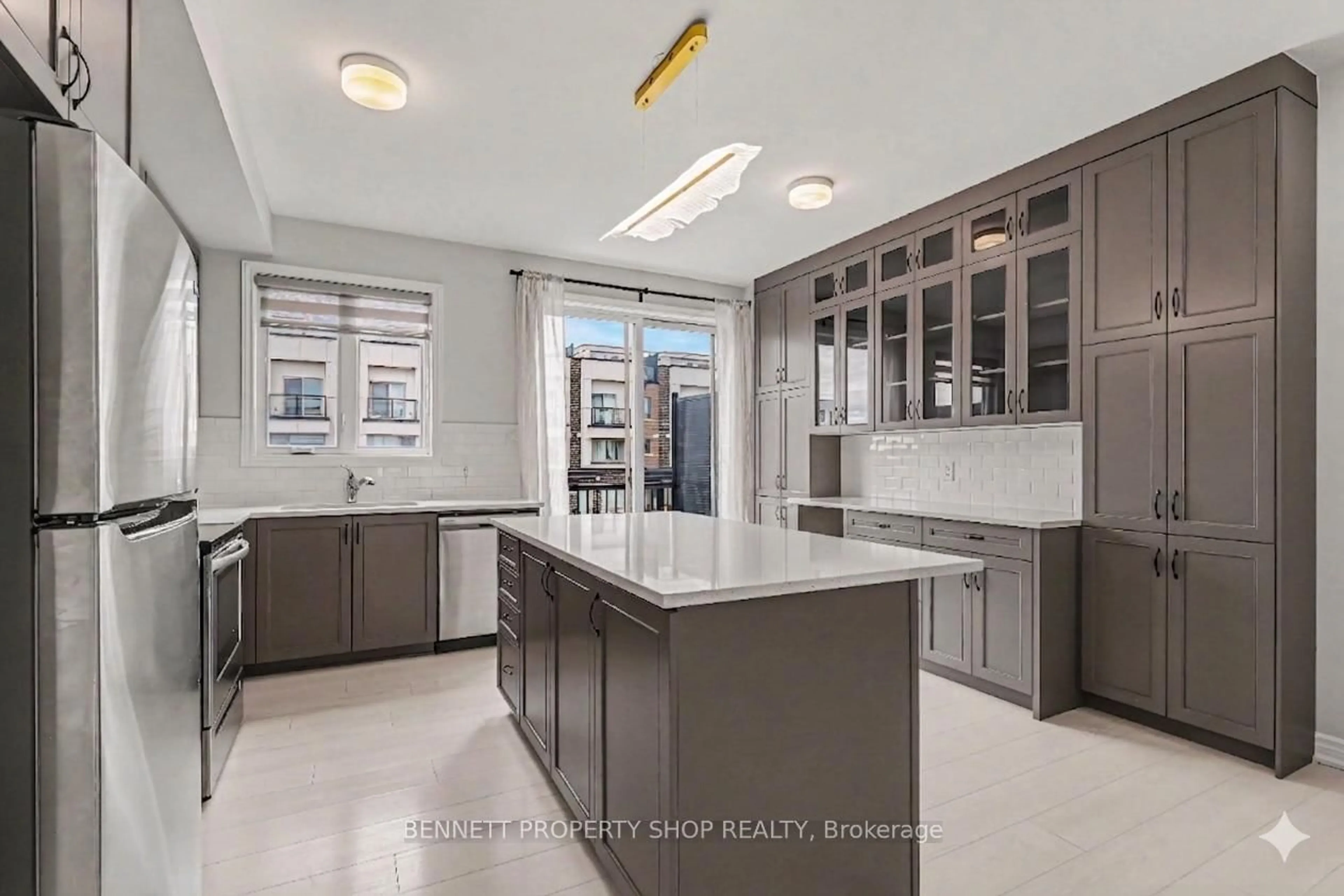 Open concept kitchen, ceramic/tile floor for 919 Moses Tennisco St, Ottawa Ontario K1K 5A8