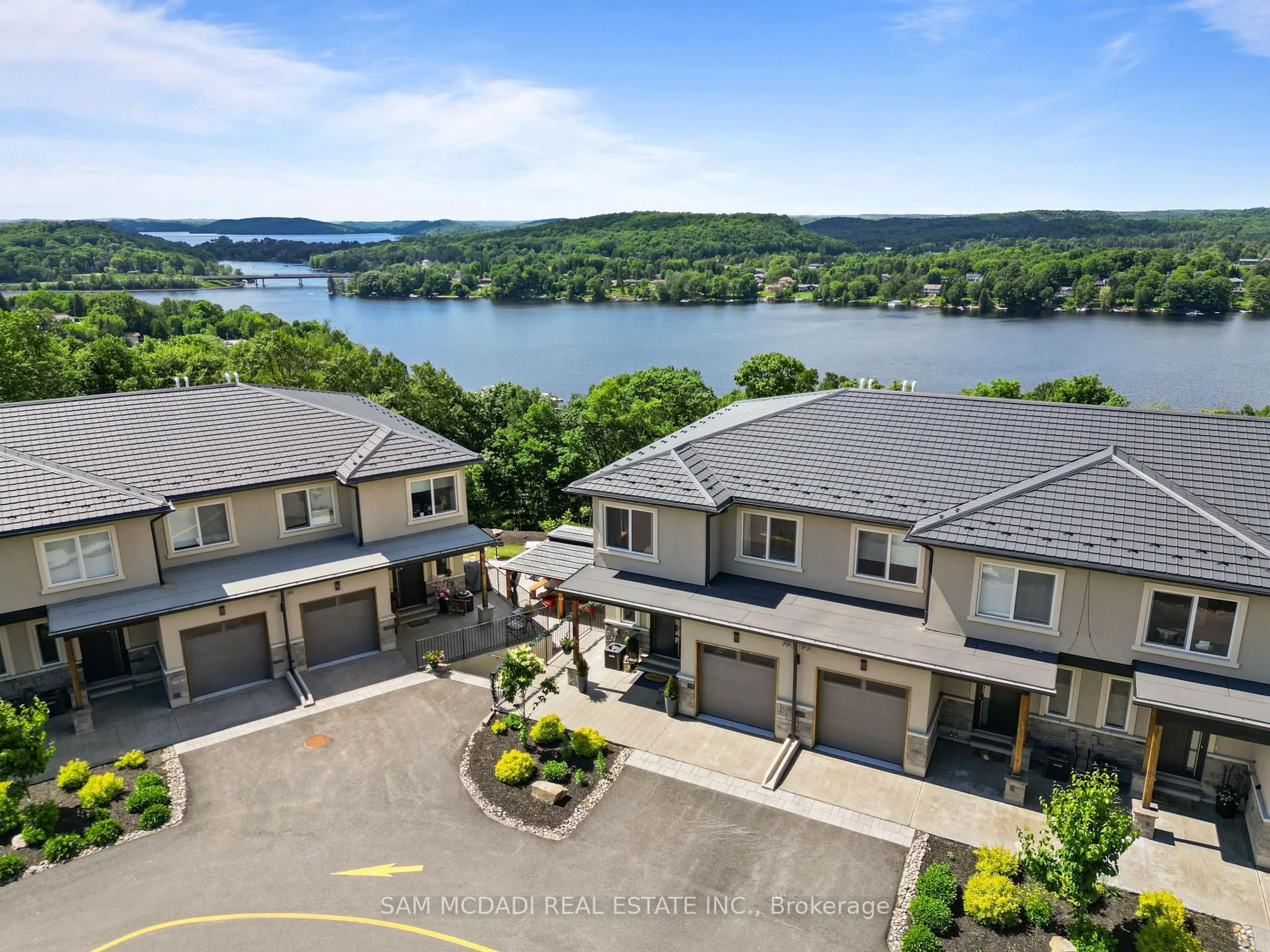 A pic from outside/outdoor area/front of a property/back of a property/a pic from drone, water/lake/river/ocean view for 21 Horizon Lane, Huntsville Ontario P1H 1V5