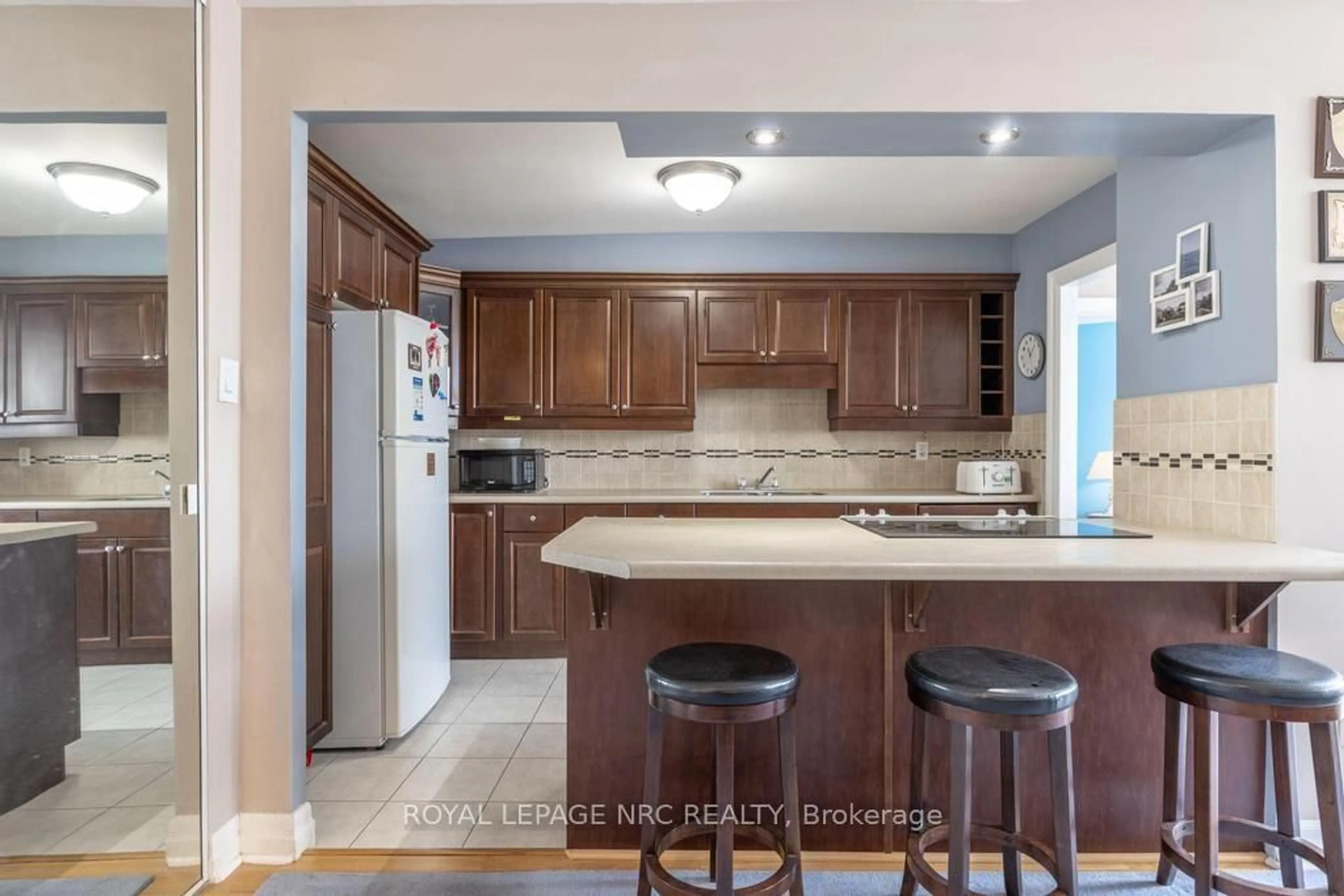Open concept kitchen, ceramic/tile floor for 15 Towering Heights Blvd #1301, St. Catharines Ontario L2T 3G7