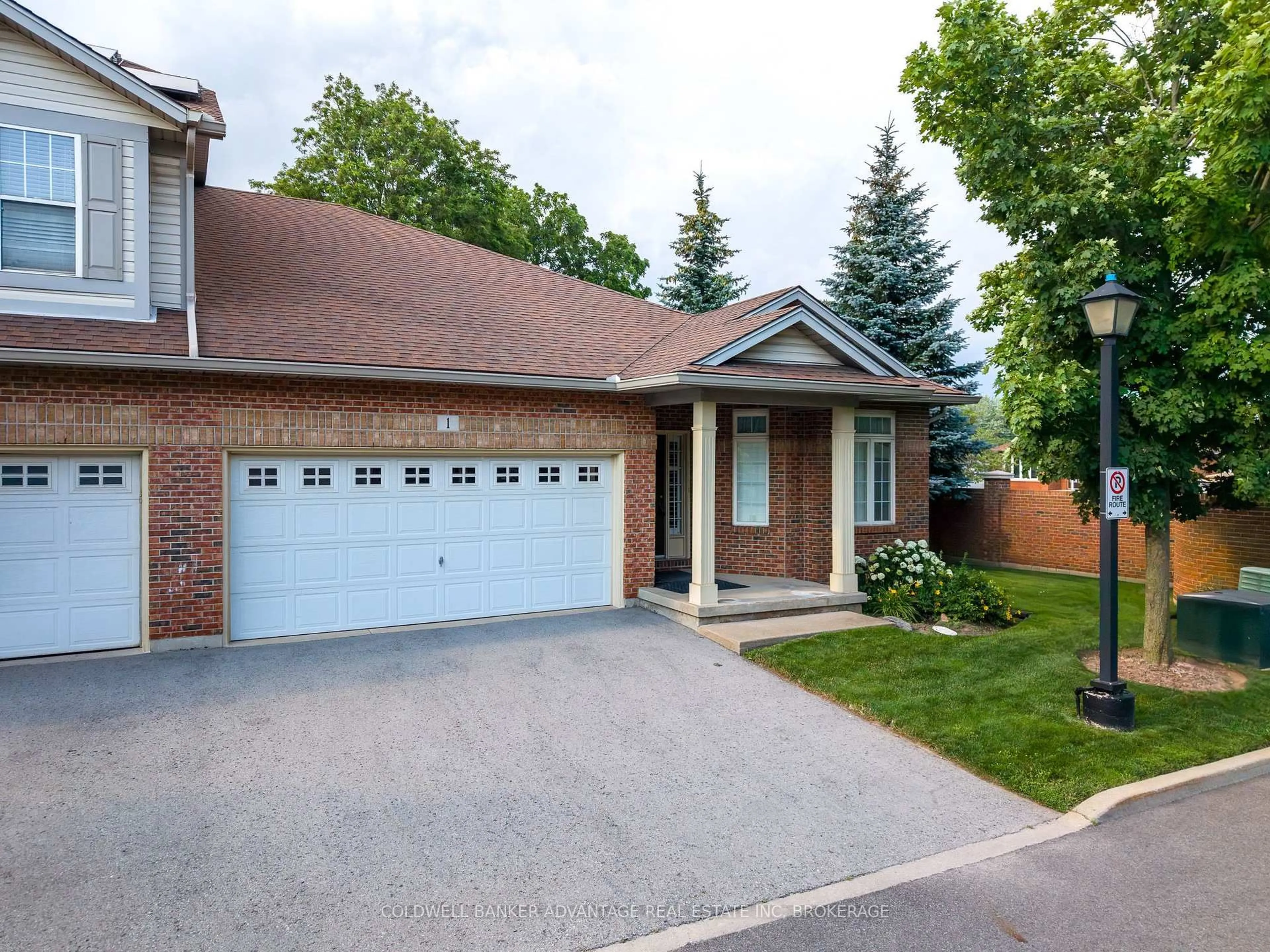 Home with brick exterior material, street for 5595 Drummond Rd #1, Niagara Falls Ontario L2G 4L2