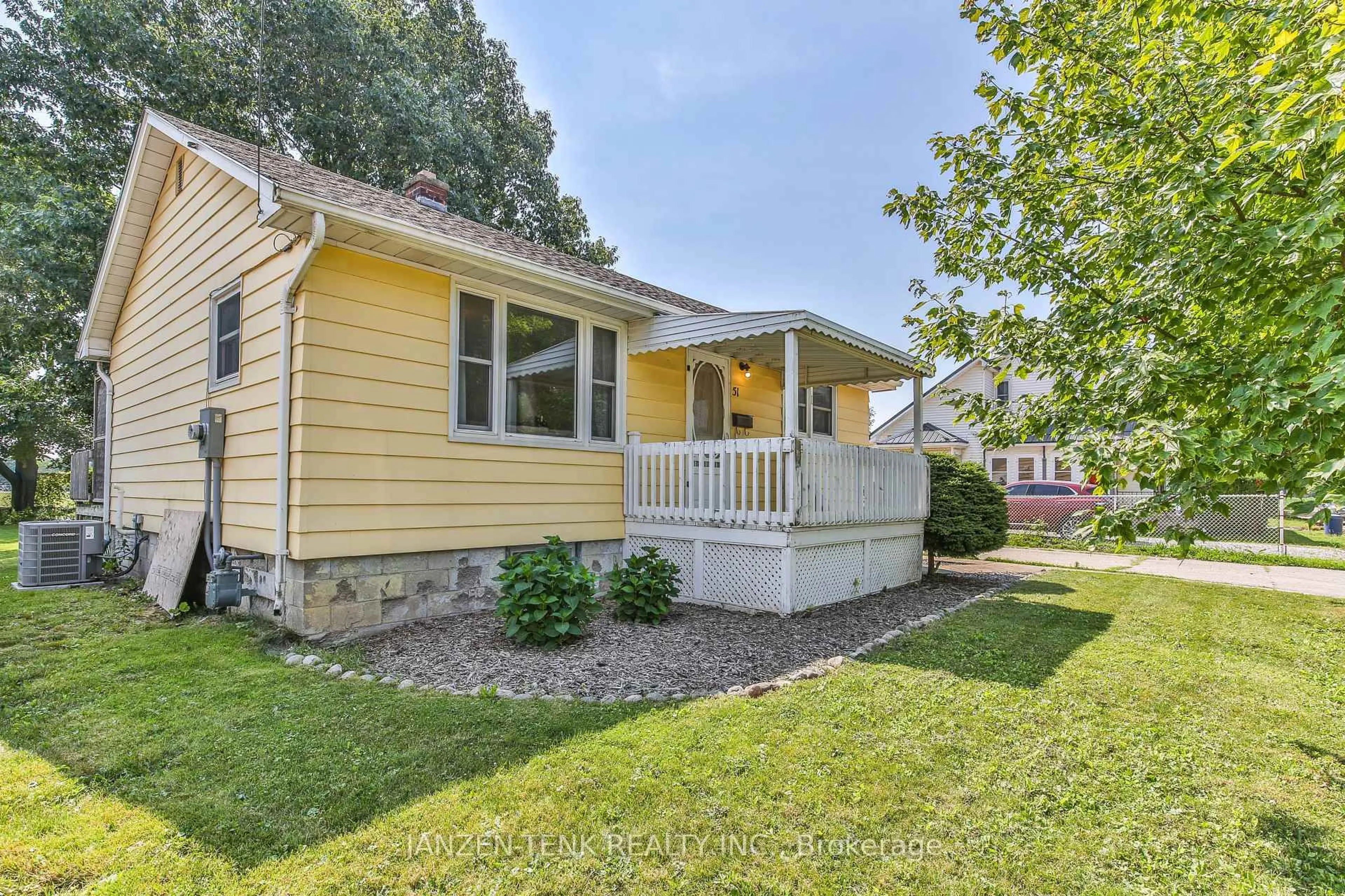 Home with vinyl exterior material, street for 51 Victoria St, Aylmer Ontario N5H 1X5