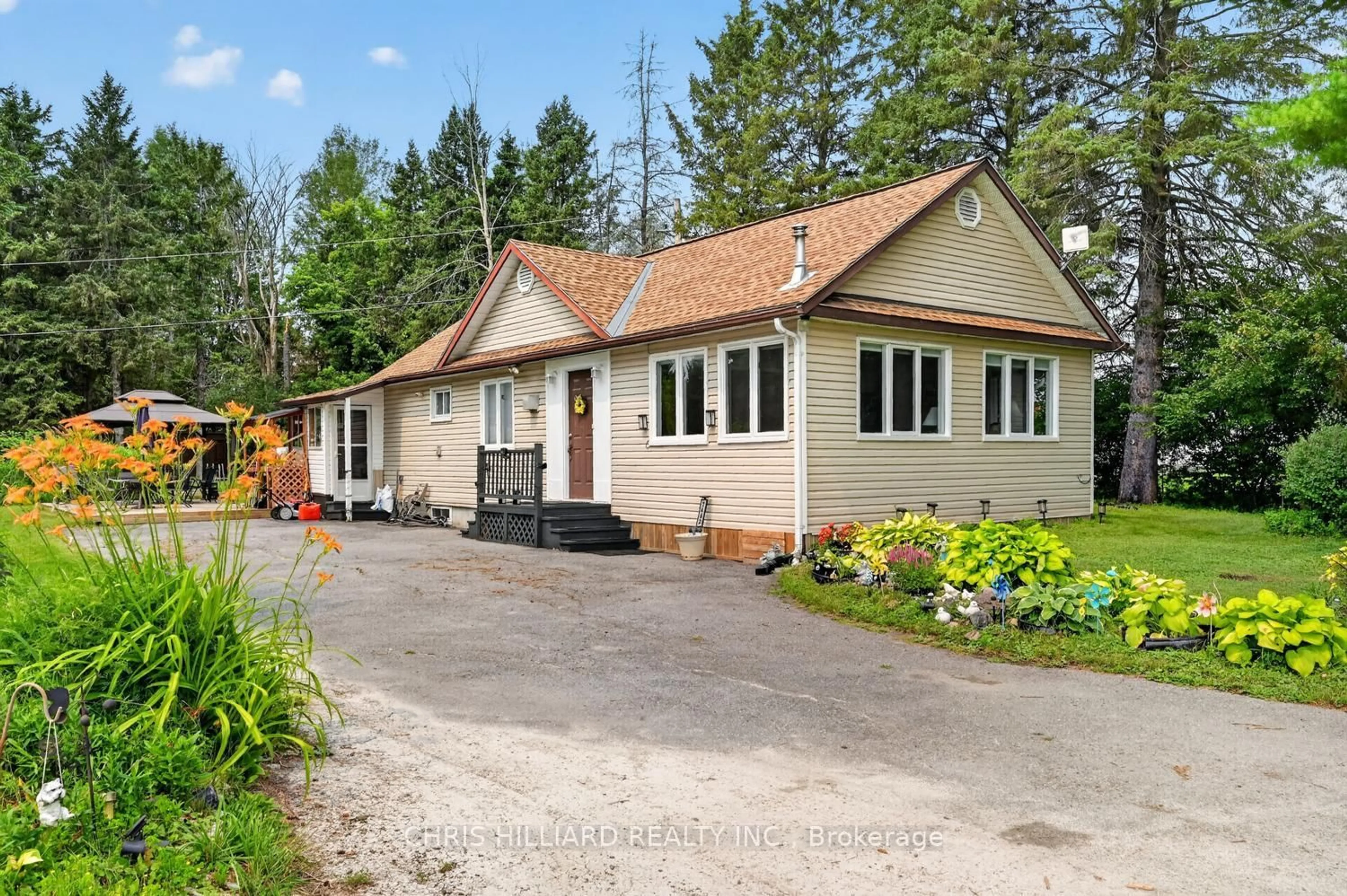 Home with vinyl exterior material, street for 7462 Carter Rd, Kars Ontario K0A 2E0