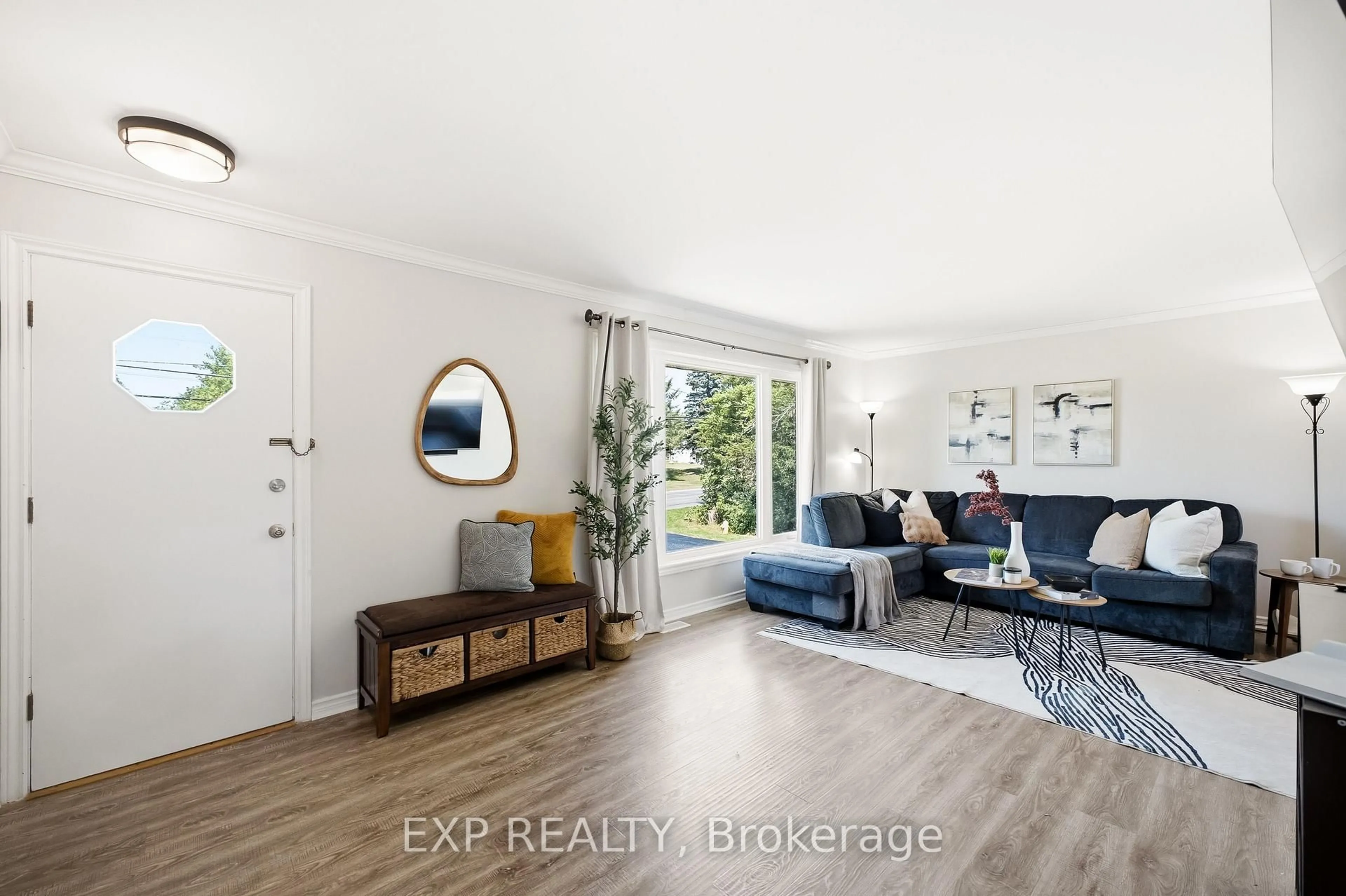 Living room with furniture, wood/laminate floor for 94 Johnstown Rd, Trenton Ontario K8V 5P8