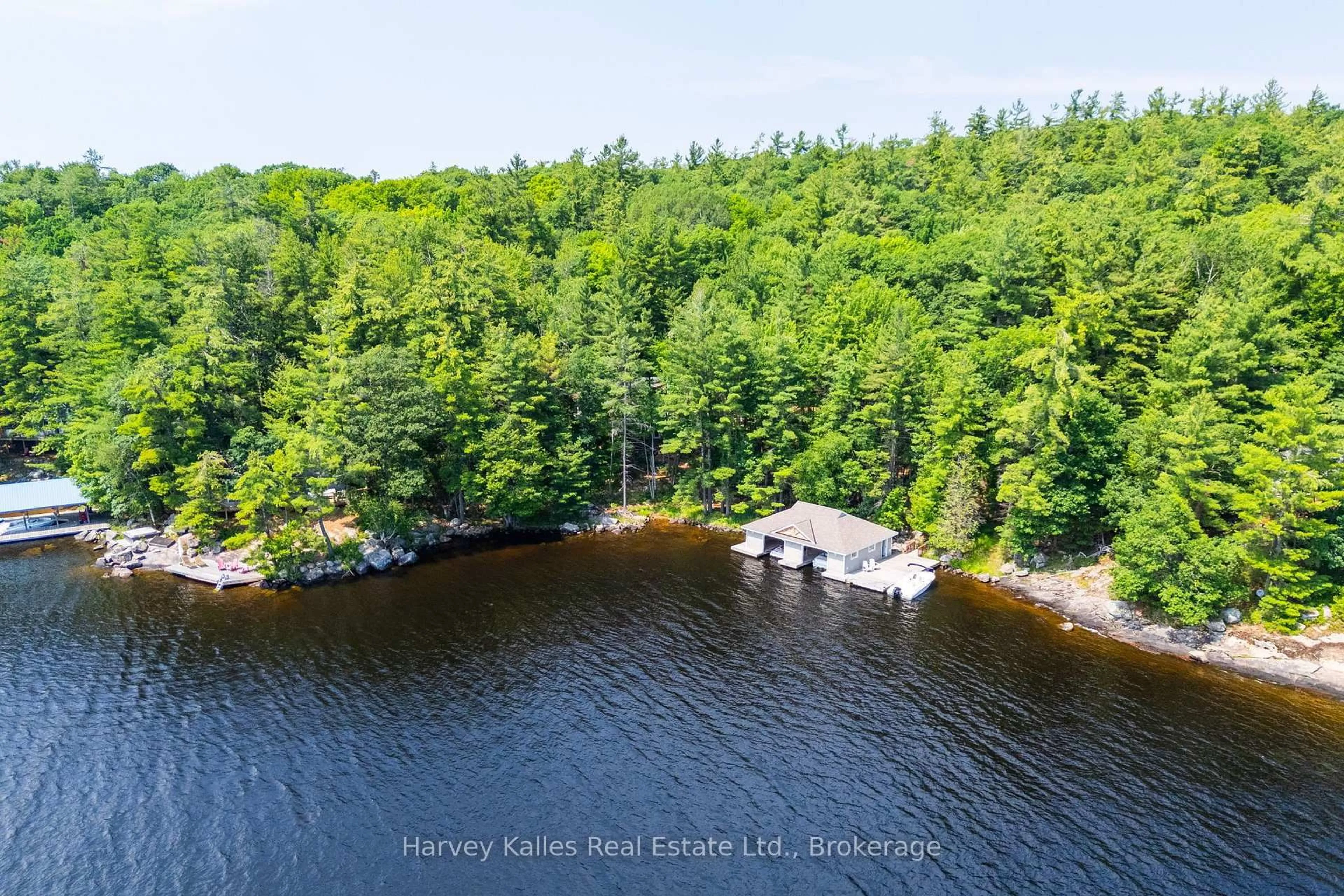 A pic from outside/outdoor area/front of a property/back of a property/a pic from drone, water/lake/river/ocean view for 37-M81 Pine Island, Muskoka Lakes Ontario P0B 1E0