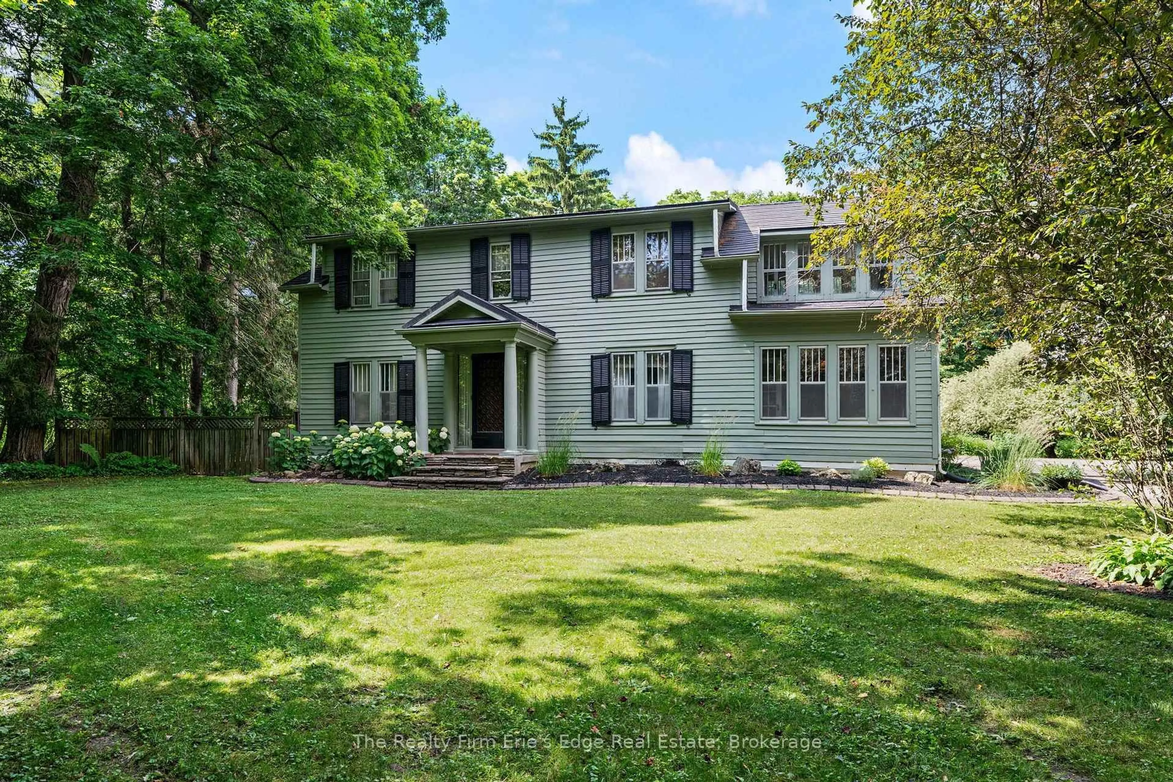 A pic from outside/outdoor area/front of a property/back of a property/a pic from drone, street for 205 Lynedoch Rd, Norfolk Ontario N4B 2W4