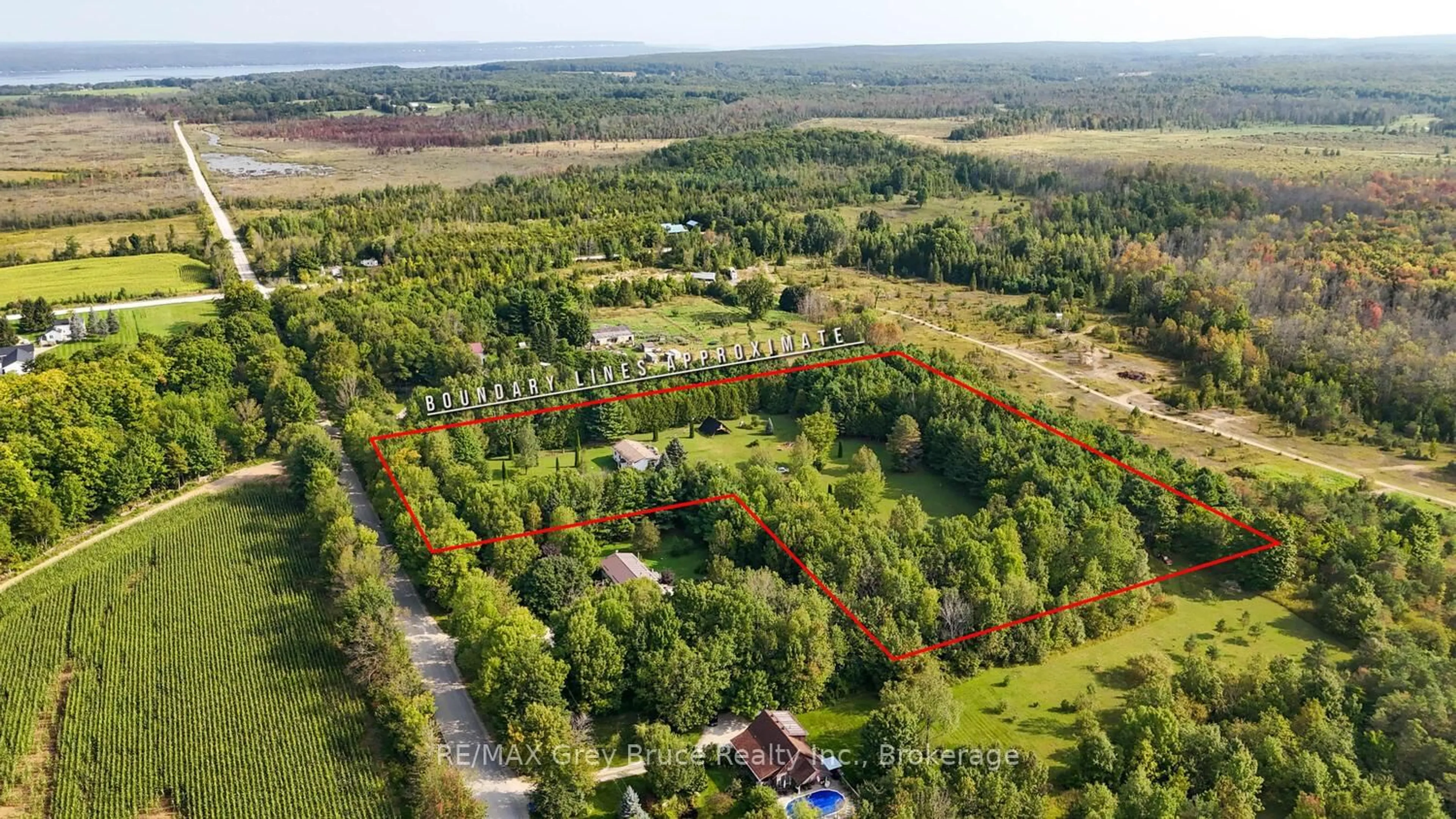 A pic from outside/outdoor area/front of a property/back of a property/a pic from drone, forest/trees view for 70183 Zion Church Rd, Georgian Bluffs Ontario N0H 2T0