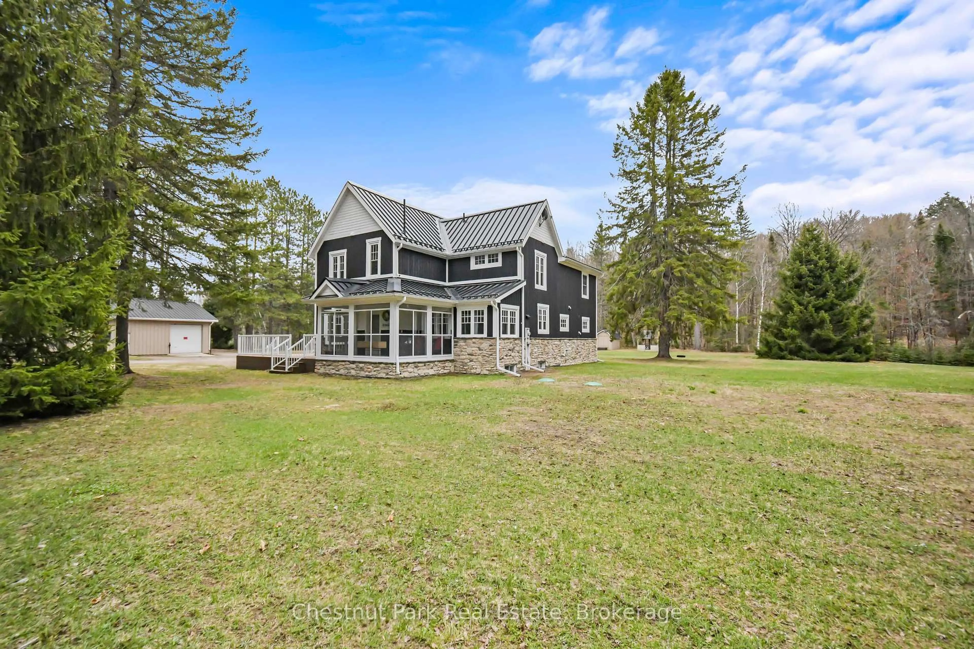 A pic from outside/outdoor area/front of a property/back of a property/a pic from drone, unknown for 12 Emsdale Lake Rd, Perry Ontario P0A 1M0