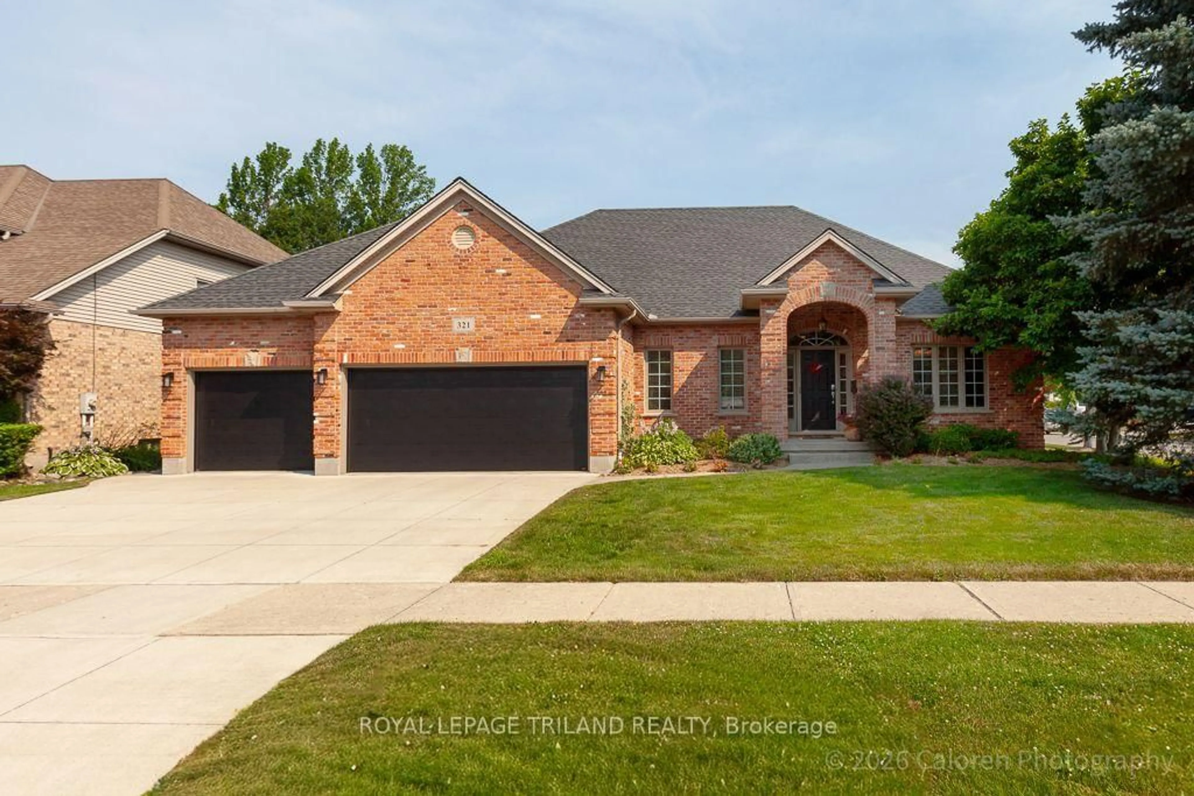 Home with brick exterior material, street for 321 Hartson Rd, London North Ontario N6H 5C2
