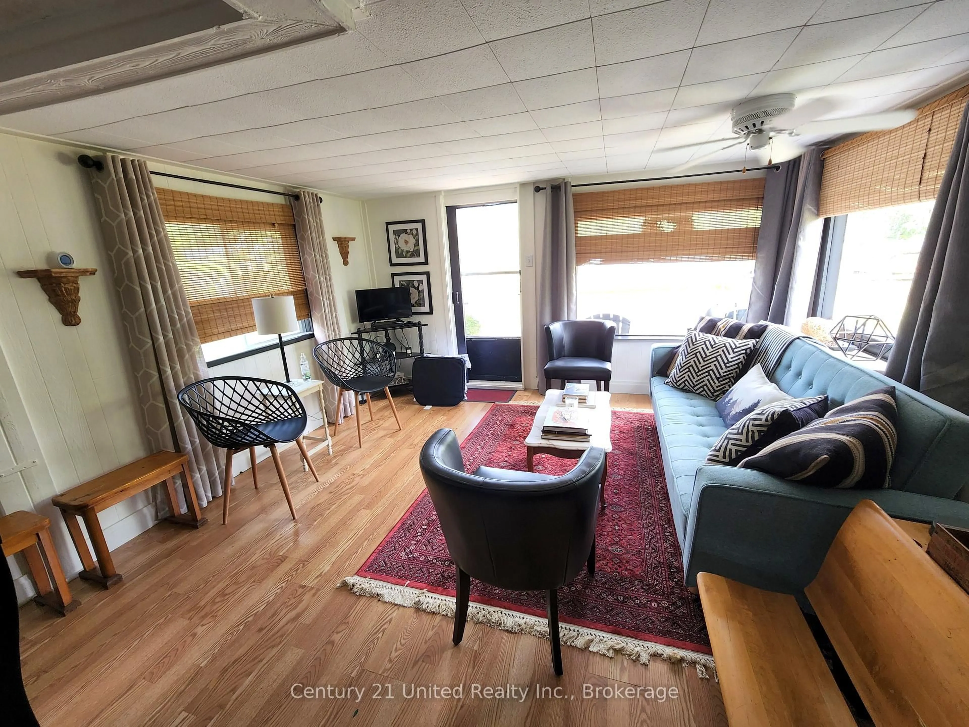Living room with furniture, wood/laminate floor for 3402 Island 340, Trent Lakes Ontario K0L 1J0