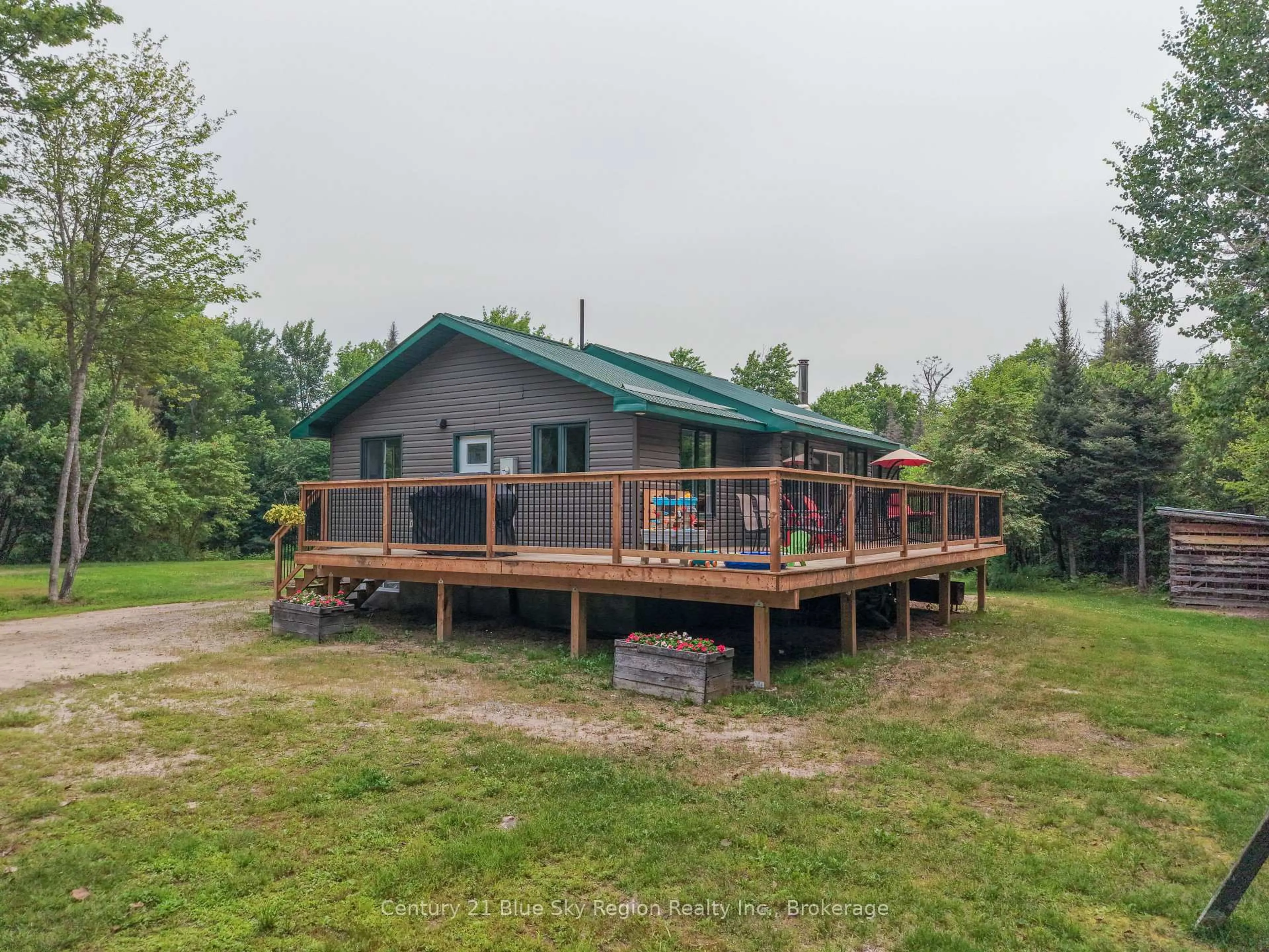 A pic from outside/outdoor area/front of a property/back of a property/a pic from drone, water/lake/river/ocean view for 887 Development Rd, Bonfield Ontario P0H 2E0