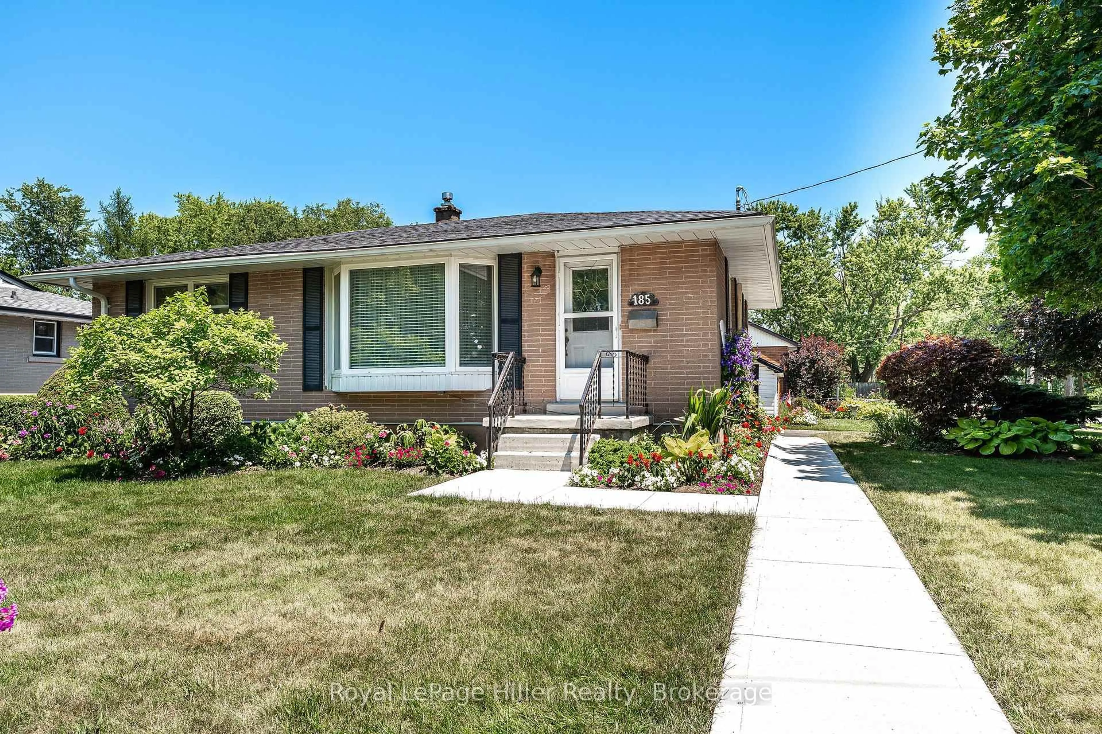 Home with vinyl exterior material, street for 185 Strachan St, Stratford Ontario N5A 2B4