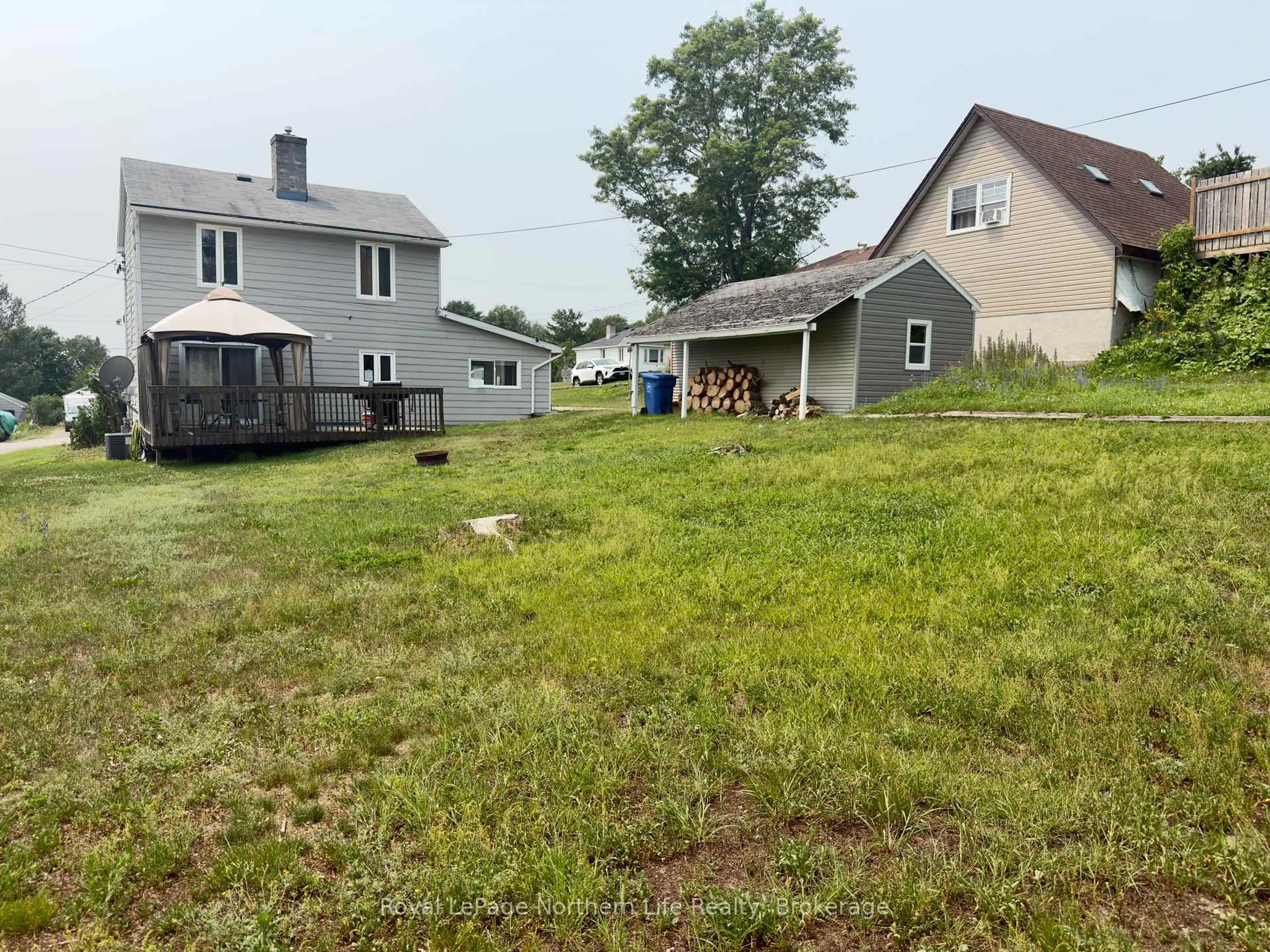 A pic from outside/outdoor area/front of a property/back of a property/a pic from drone, street for 331 Eight St, Mattawa Ontario P0H 1V0