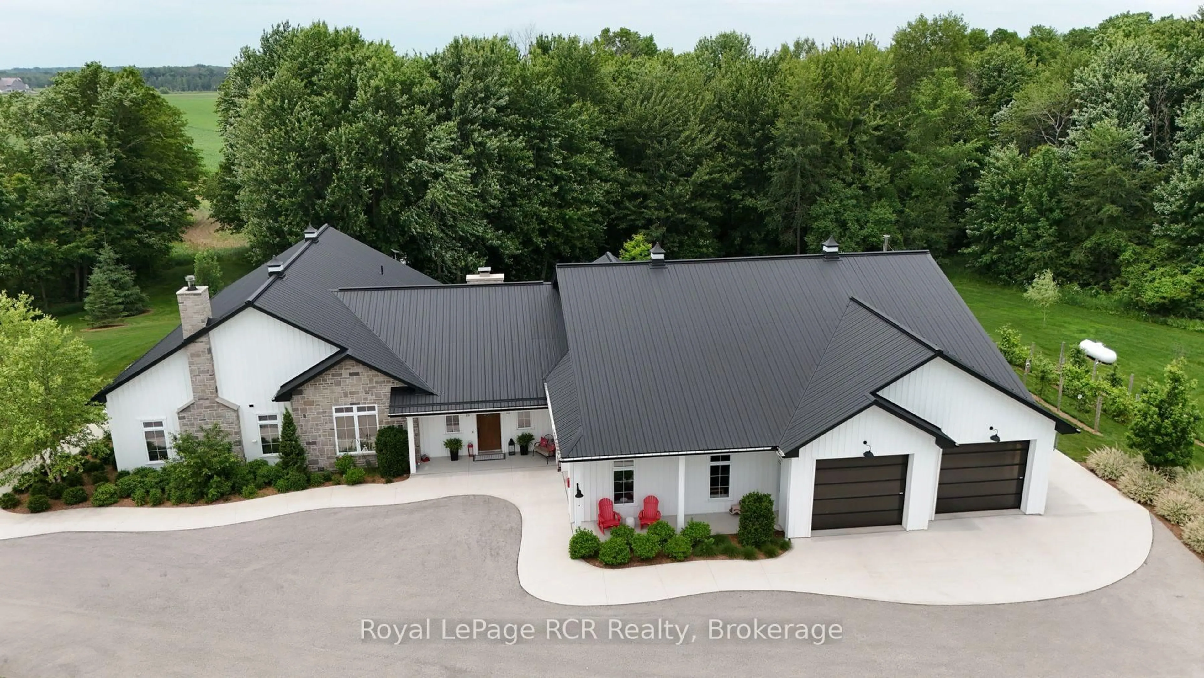 A pic from outside/outdoor area/front of a property/back of a property/a pic from drone, building for 42085 ROAD 71 Rd, West Grey Ontario N0G 2L0