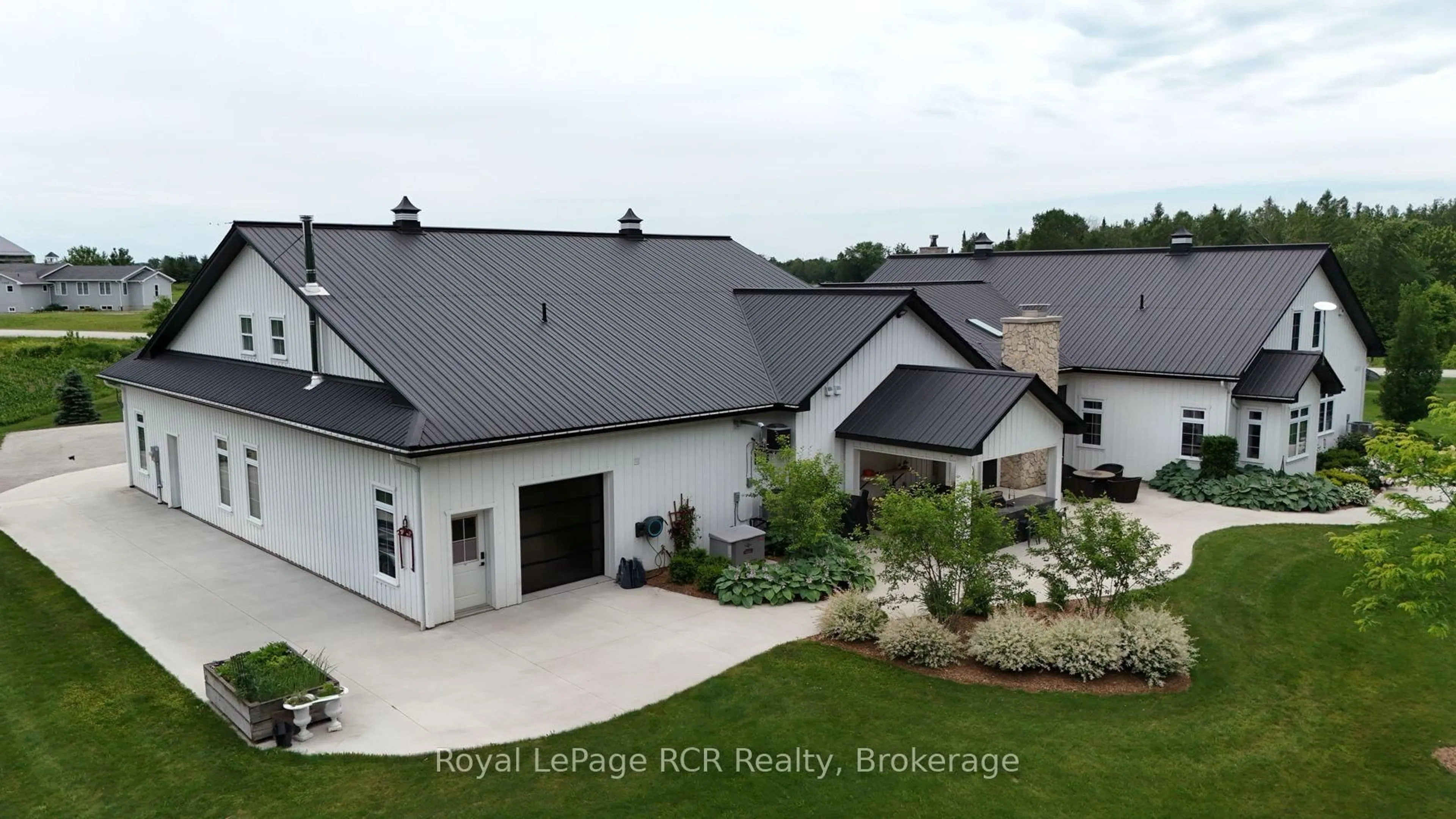 A pic from outside/outdoor area/front of a property/back of a property/a pic from drone, building for 42085 ROAD 71 Rd, West Grey Ontario N0G 2L0