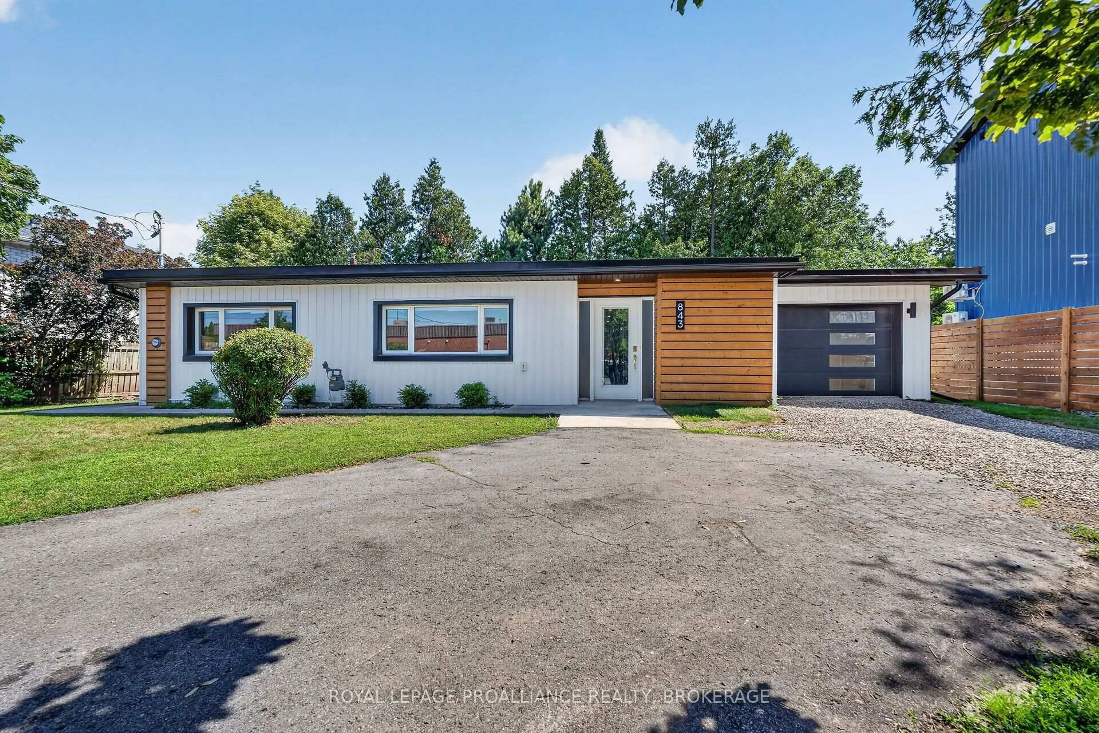 Home with vinyl exterior material, street for 843 Woodbine Rd, Kingston Ontario K7P 2X3