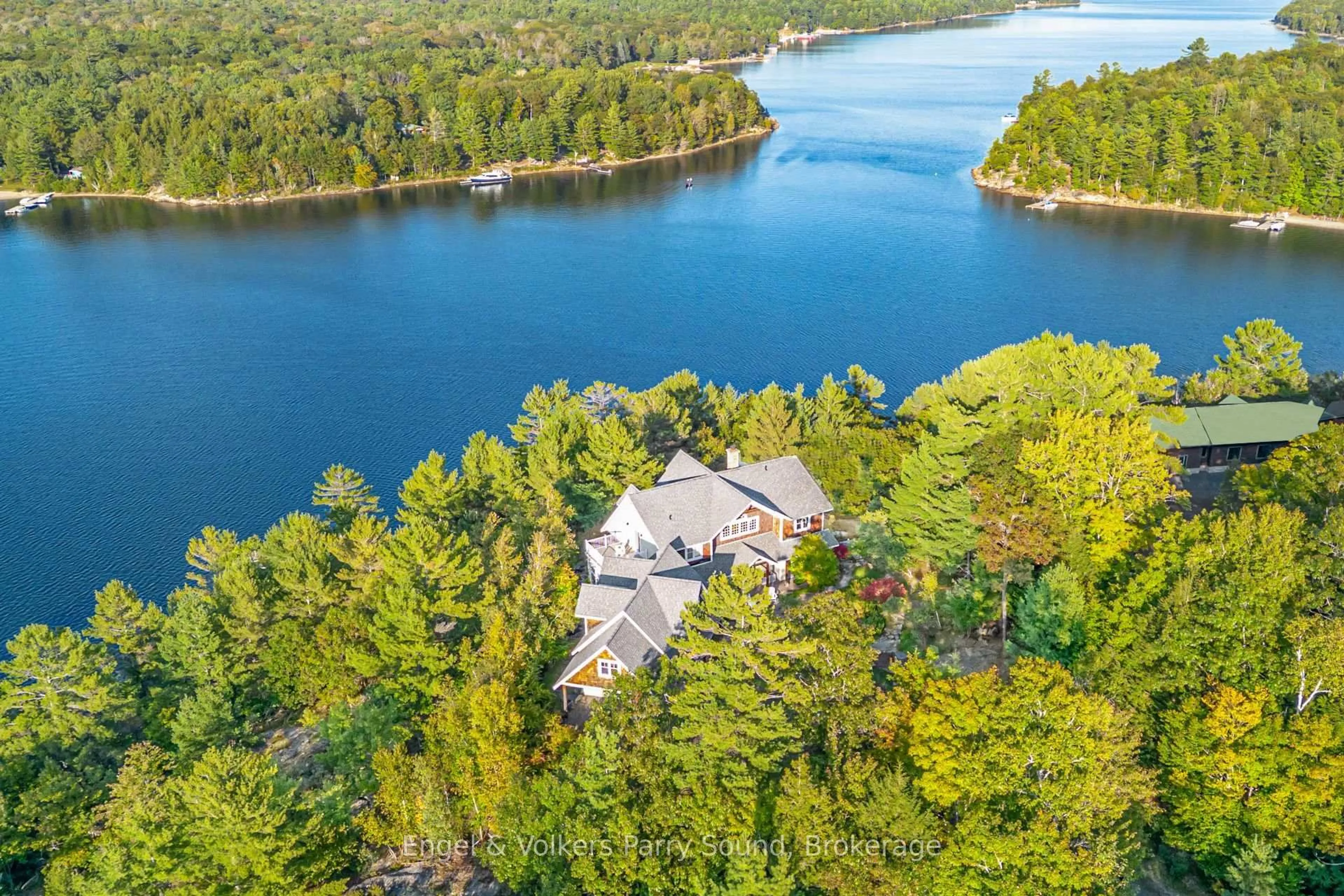 A pic from outside/outdoor area/front of a property/back of a property/a pic from drone, water/lake/river/ocean view for 22 Beacon Point Dr, Carling Ontario P0G 1G0